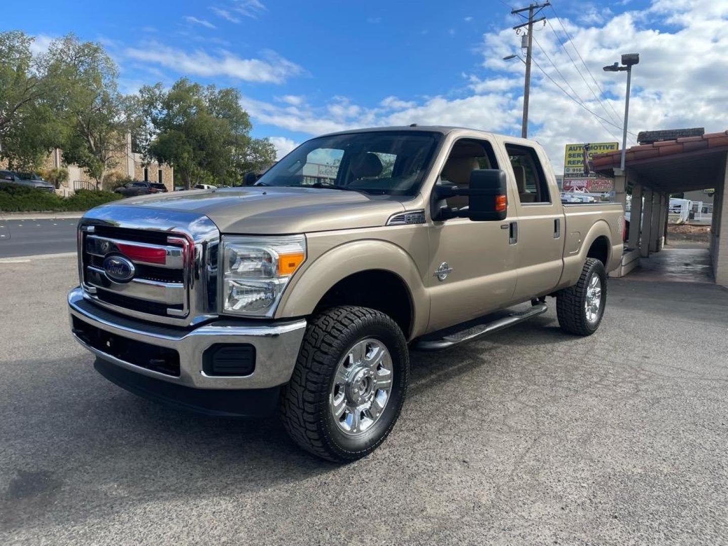 2013 Pale Adobe Metallic Ford F-250 Super Duty XLT (1FT7W2BT1DE) with an 6.7L Power Stroke 6.7L Biodiesel Turbo V8 400hp 800ft. lbs. Common Rail Direct Injection engine, 6-Speed Shiftable Automatic transmission, located at 800 Riverside Ave, Roseville, CA, 95678, 916-773-4549 & Toll Free: 866-719-4393, 38.732265, -121.291039 - DIESEL CREW CAB 4X4 XLT NEW TIRES CLEAN CARFAX - Photo#0