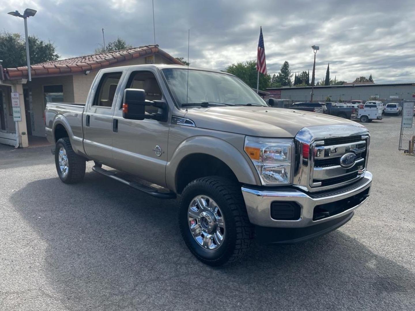 2013 Pale Adobe Metallic Ford F-250 Super Duty XLT (1FT7W2BT1DE) with an 6.7L Power Stroke 6.7L Biodiesel Turbo V8 400hp 800ft. lbs. Common Rail Direct Injection engine, 6-Speed Shiftable Automatic transmission, located at 800 Riverside Ave, Roseville, CA, 95678, 916-773-4549 & Toll Free: 866-719-4393, 38.732265, -121.291039 - DIESEL CREW CAB 4X4 XLT NEW TIRES CLEAN CARFAX - Photo#1
