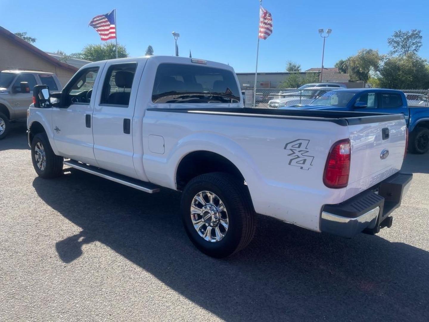 2013 Oxford White Ford F-250 Super Duty XLT (1FT7W2BT0DE) with an 6.7L Power Stroke 6.7L Biodiesel Turbo V8 400hp 800ft. lbs. Common Rail Direct Injection engine, 6-Speed Shiftable Automatic transmission, located at 800 Riverside Ave, Roseville, CA, 95678, 916-773-4549 & Toll Free: 866-719-4393, 38.732265, -121.291039 - DIESEL CREW CAB 4X4 XLT - Photo#2