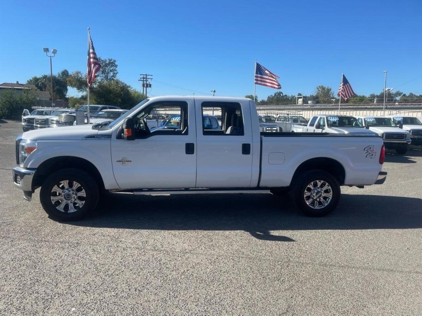2013 Oxford White Ford F-250 Super Duty XLT (1FT7W2BT0DE) with an 6.7L Power Stroke 6.7L Biodiesel Turbo V8 400hp 800ft. lbs. Common Rail Direct Injection engine, 6-Speed Shiftable Automatic transmission, located at 800 Riverside Ave, Roseville, CA, 95678, 916-773-4549 & Toll Free: 866-719-4393, 38.732265, -121.291039 - DIESEL CREW CAB 4X4 XLT - Photo#4