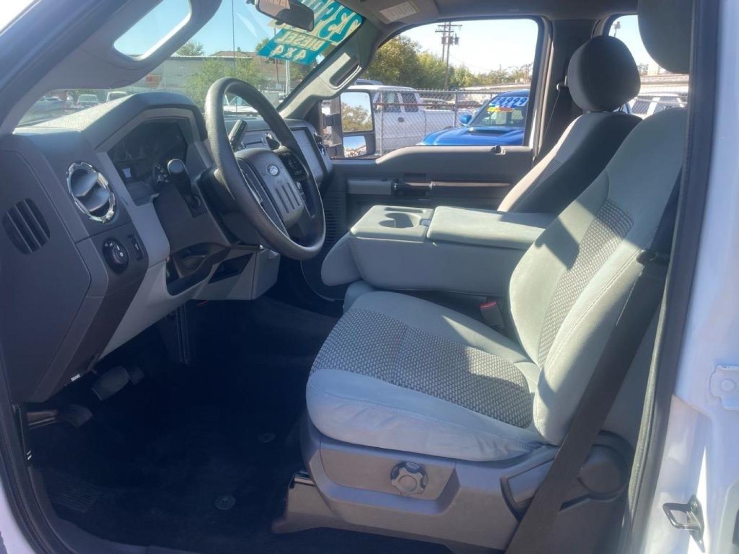 2013 Oxford White Ford F-250 Super Duty XLT (1FT7W2BT0DE) with an 6.7L Power Stroke 6.7L Biodiesel Turbo V8 400hp 800ft. lbs. Common Rail Direct Injection engine, 6-Speed Shiftable Automatic transmission, located at 800 Riverside Ave, Roseville, CA, 95678, 916-773-4549 & Toll Free: 866-719-4393, 38.732265, -121.291039 - DIESEL CREW CAB 4X4 XLT - Photo#9