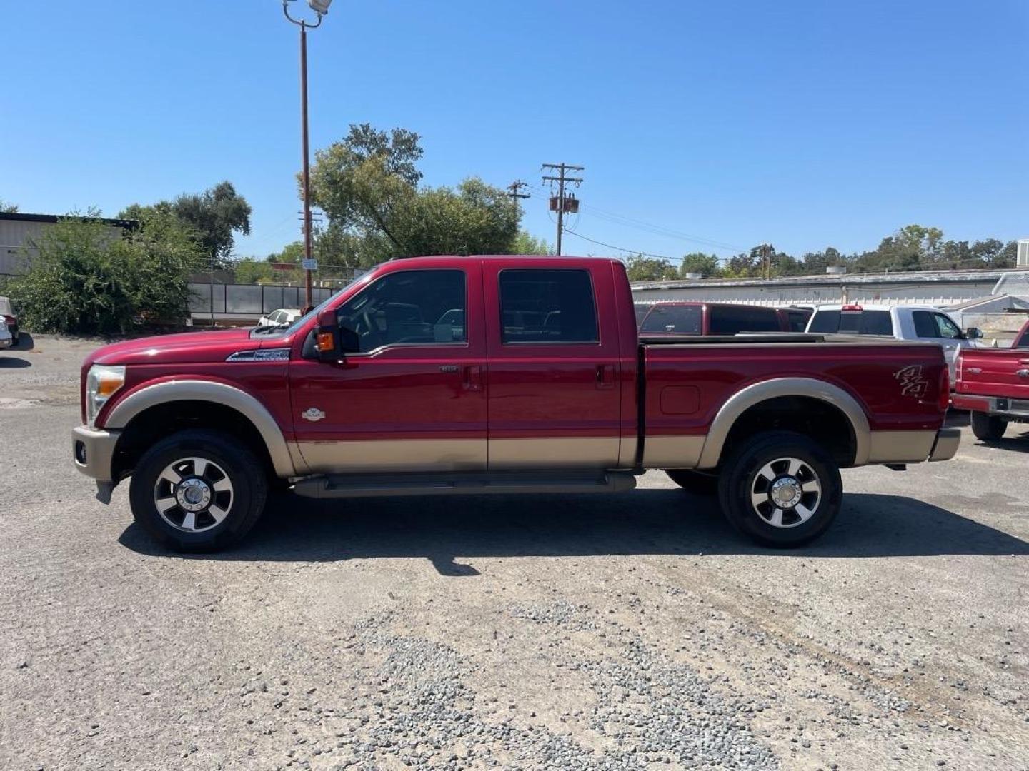 2013 Autumn Red Metallic/Pale Adobe Metallic Ford F-350 Super Duty King Ranch (1FT8W3BT3DE) with an 6.7L Power Stroke 6.7L Biodiesel Turbo V8 400hp 800ft. lbs. Common Rail Direct Injection engine, 6-Speed Shiftable Automatic transmission, located at 800 Riverside Ave, Roseville, CA, 95678, 916-773-4549 & Toll Free: 866-719-4393, 38.732265, -121.291039 - DIESEL CREW CAB 4X4 KING RANCH SERVICE RECORDS - Photo#1