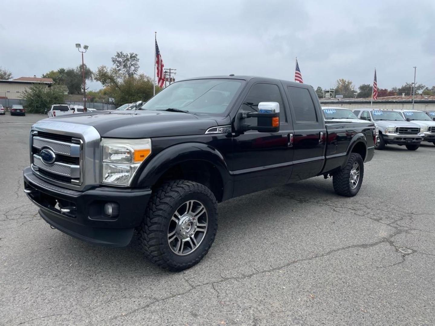 2013 Tuxedo Black Metallic Ford F-350 Super Duty Platinum (1FT8W3BT9DE) with an 6.7L Power Stroke 6.7L Biodiesel Turbo V8 400hp 800ft. lbs. Common Rail Direct Injection engine, 6-Speed Shiftable Automatic transmission, located at 800 Riverside Ave, Roseville, CA, 95678, 916-773-4549 & Toll Free: 866-719-4393, 38.732265, -121.291039 - Photo#0