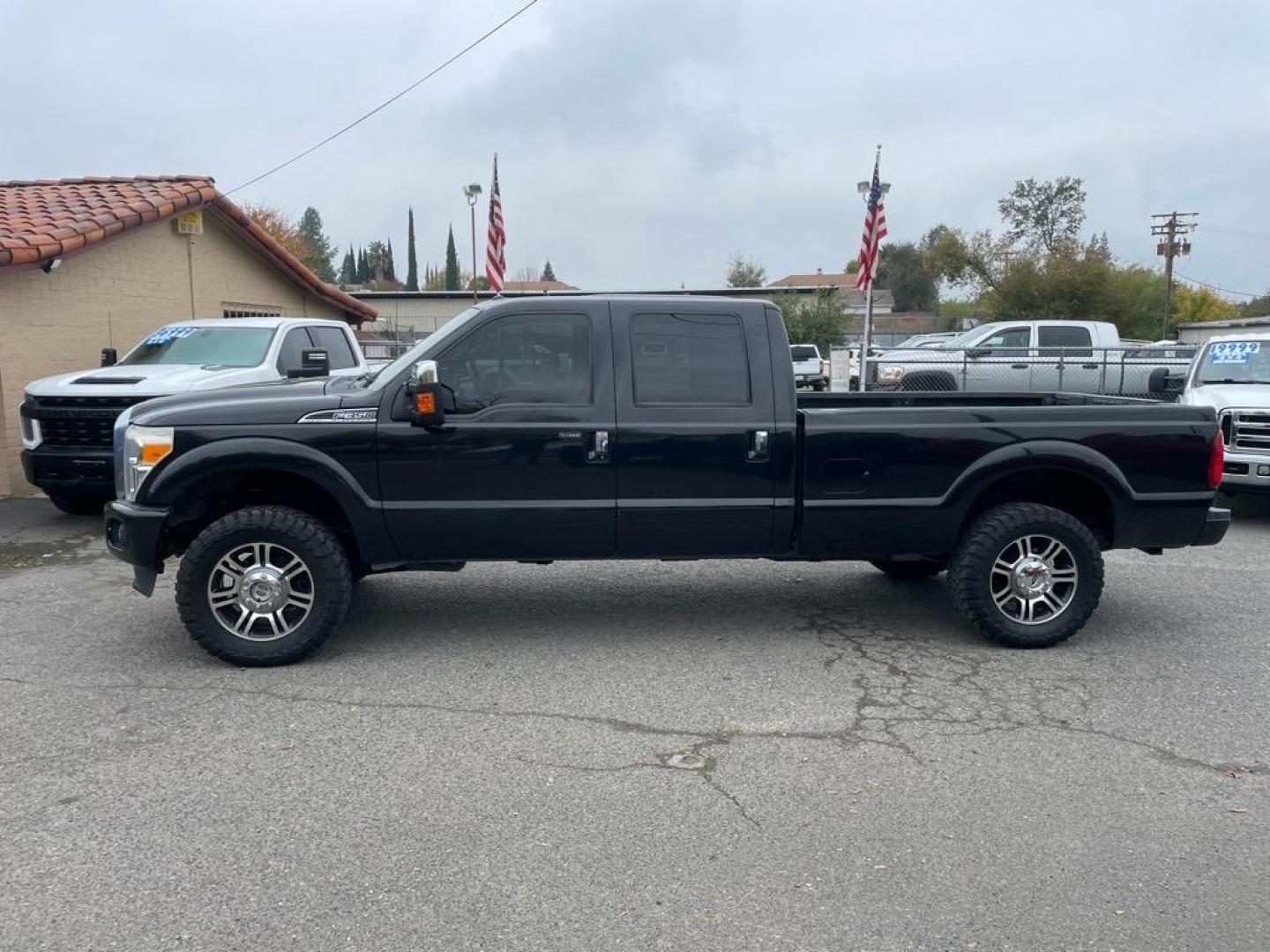 2013 Tuxedo Black Metallic Ford F-350 Super Duty Platinum (1FT8W3BT9DE) with an 6.7L Power Stroke 6.7L Biodiesel Turbo V8 400hp 800ft. lbs. Common Rail Direct Injection engine, 6-Speed Shiftable Automatic transmission, located at 800 Riverside Ave, Roseville, CA, 95678, 916-773-4549 & Toll Free: 866-719-4393, 38.732265, -121.291039 - Photo#1
