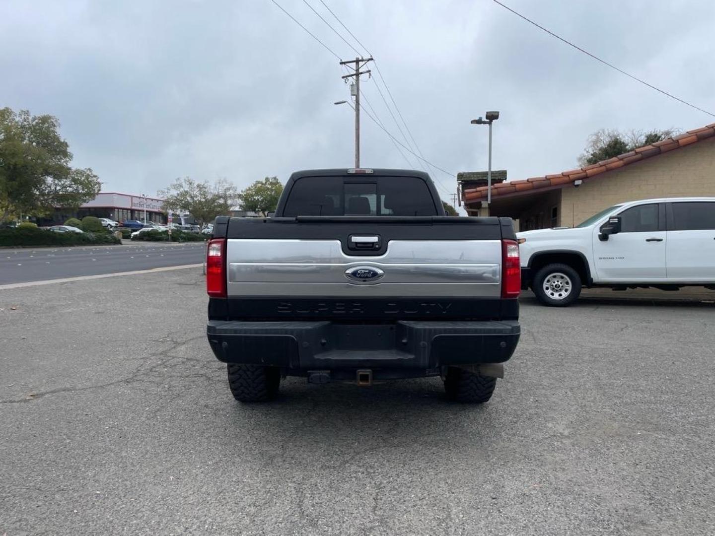 2013 Tuxedo Black Metallic Ford F-350 Super Duty Platinum (1FT8W3BT9DE) with an 6.7L Power Stroke 6.7L Biodiesel Turbo V8 400hp 800ft. lbs. Common Rail Direct Injection engine, 6-Speed Shiftable Automatic transmission, located at 800 Riverside Ave, Roseville, CA, 95678, 916-773-4549 & Toll Free: 866-719-4393, 38.732265, -121.291039 - Photo#2