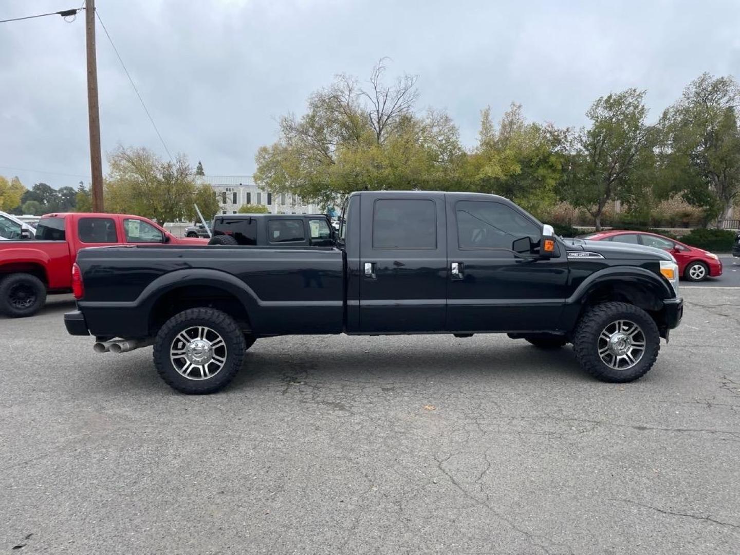 2013 Tuxedo Black Metallic Ford F-350 Super Duty Platinum (1FT8W3BT9DE) with an 6.7L Power Stroke 6.7L Biodiesel Turbo V8 400hp 800ft. lbs. Common Rail Direct Injection engine, 6-Speed Shiftable Automatic transmission, located at 800 Riverside Ave, Roseville, CA, 95678, 916-773-4549 & Toll Free: 866-719-4393, 38.732265, -121.291039 - Photo#4