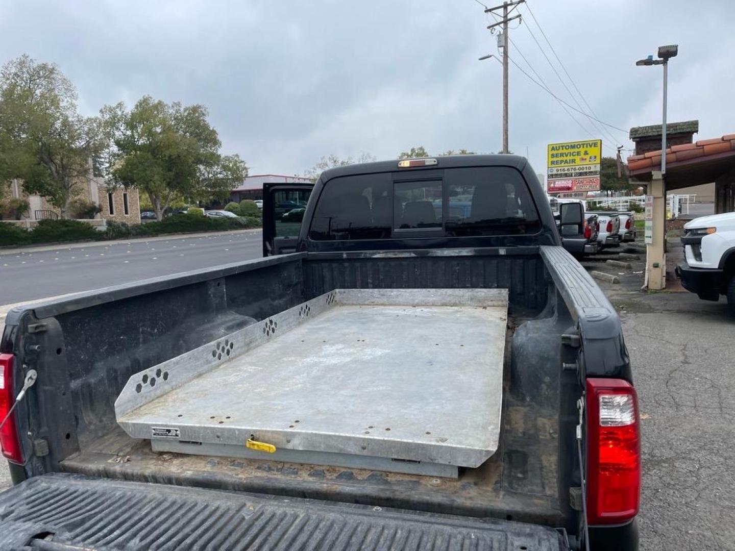 2013 Tuxedo Black Metallic Ford F-350 Super Duty Platinum (1FT8W3BT9DE) with an 6.7L Power Stroke 6.7L Biodiesel Turbo V8 400hp 800ft. lbs. Common Rail Direct Injection engine, 6-Speed Shiftable Automatic transmission, located at 800 Riverside Ave, Roseville, CA, 95678, 916-773-4549 & Toll Free: 866-719-4393, 38.732265, -121.291039 - Photo#11