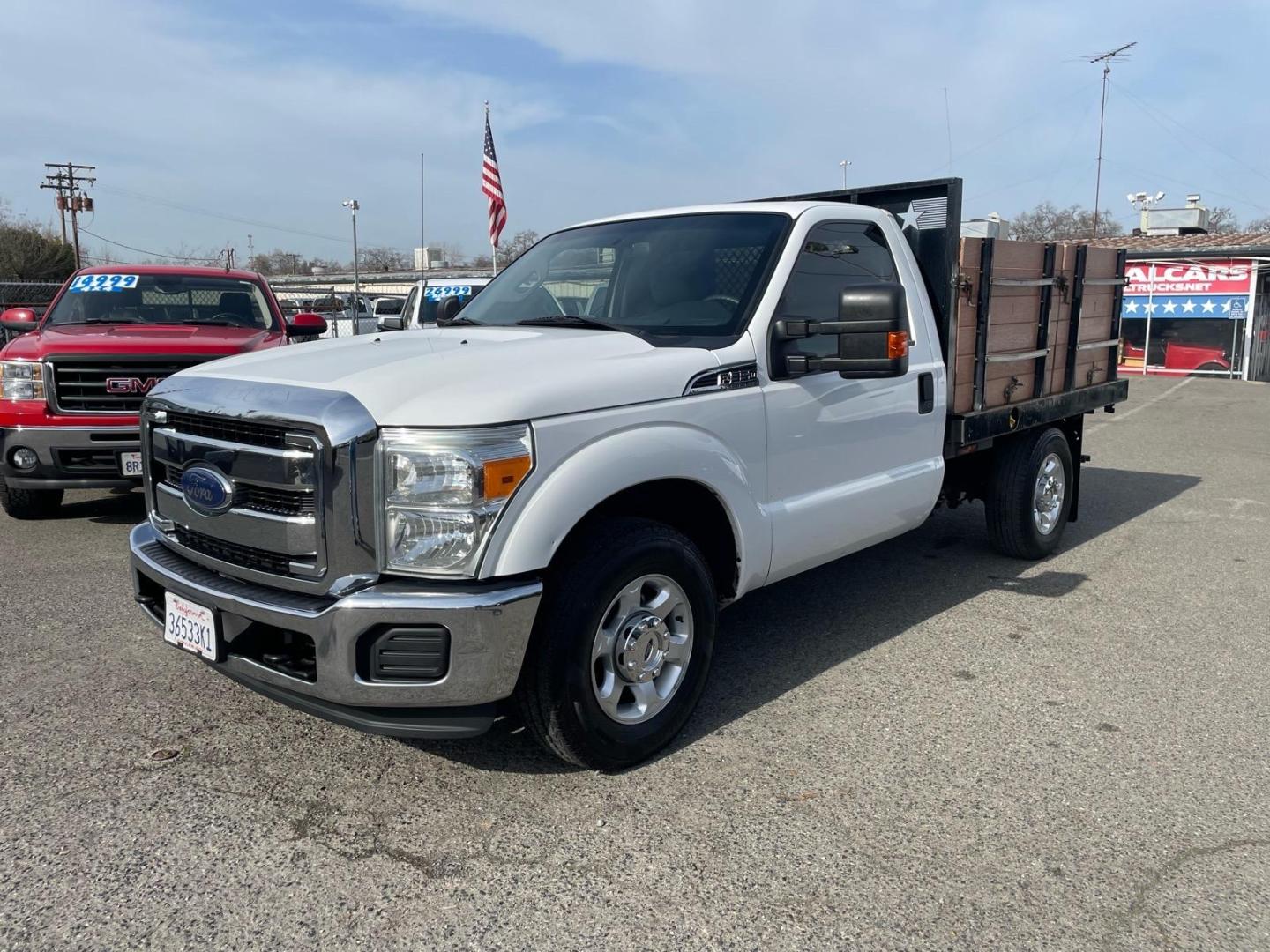 2013 Oxford White Ford F-350 Super Duty XLT (1FDBF3A67DE) with an 6.2L 6.2L Flex Fuel V8 385hp 405ft. lbs. Sequential Electronic Fuel Injection engine, 6-Speed Shiftable Automatic transmission, located at 800 Riverside Ave, Roseville, CA, 95678, 916-773-4549 & Toll Free: 866-719-4393, 38.732265, -121.291039 - FLATBED XLT SERVICE RECORDS ON CLEAN CARFAX - Photo#0