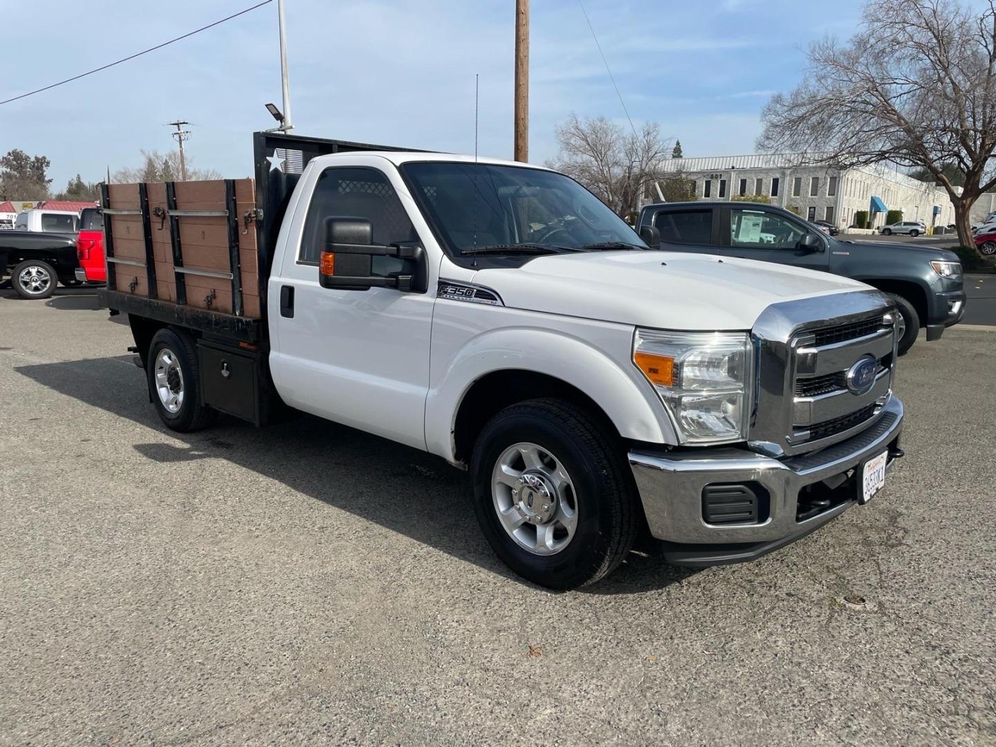 2013 Oxford White Ford F-350 Super Duty XLT (1FDBF3A67DE) with an 6.2L 6.2L Flex Fuel V8 385hp 405ft. lbs. Sequential Electronic Fuel Injection engine, 6-Speed Shiftable Automatic transmission, located at 800 Riverside Ave, Roseville, CA, 95678, 916-773-4549 & Toll Free: 866-719-4393, 38.732265, -121.291039 - FLATBED XLT SERVICE RECORDS ON CLEAN CARFAX - Photo#3