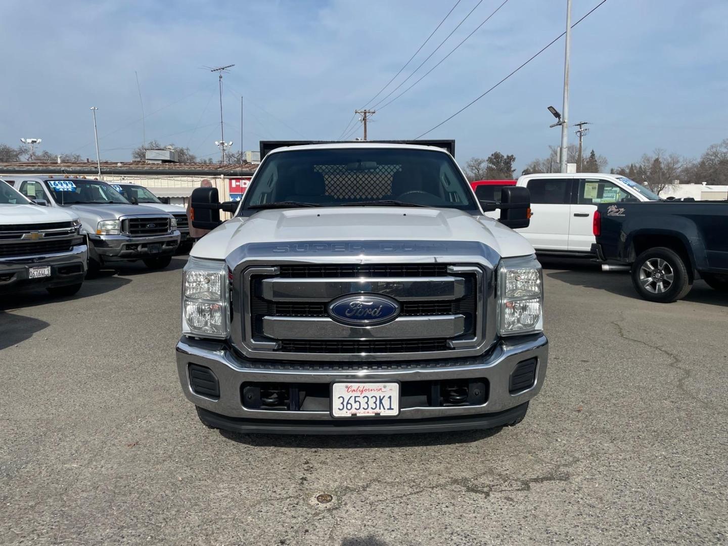 2013 Oxford White Ford F-350 Super Duty XLT (1FDBF3A67DE) with an 6.2L 6.2L Flex Fuel V8 385hp 405ft. lbs. Sequential Electronic Fuel Injection engine, 6-Speed Shiftable Automatic transmission, located at 800 Riverside Ave, Roseville, CA, 95678, 916-773-4549 & Toll Free: 866-719-4393, 38.732265, -121.291039 - FLATBED XLT SERVICE RECORDS ON CLEAN CARFAX - Photo#4