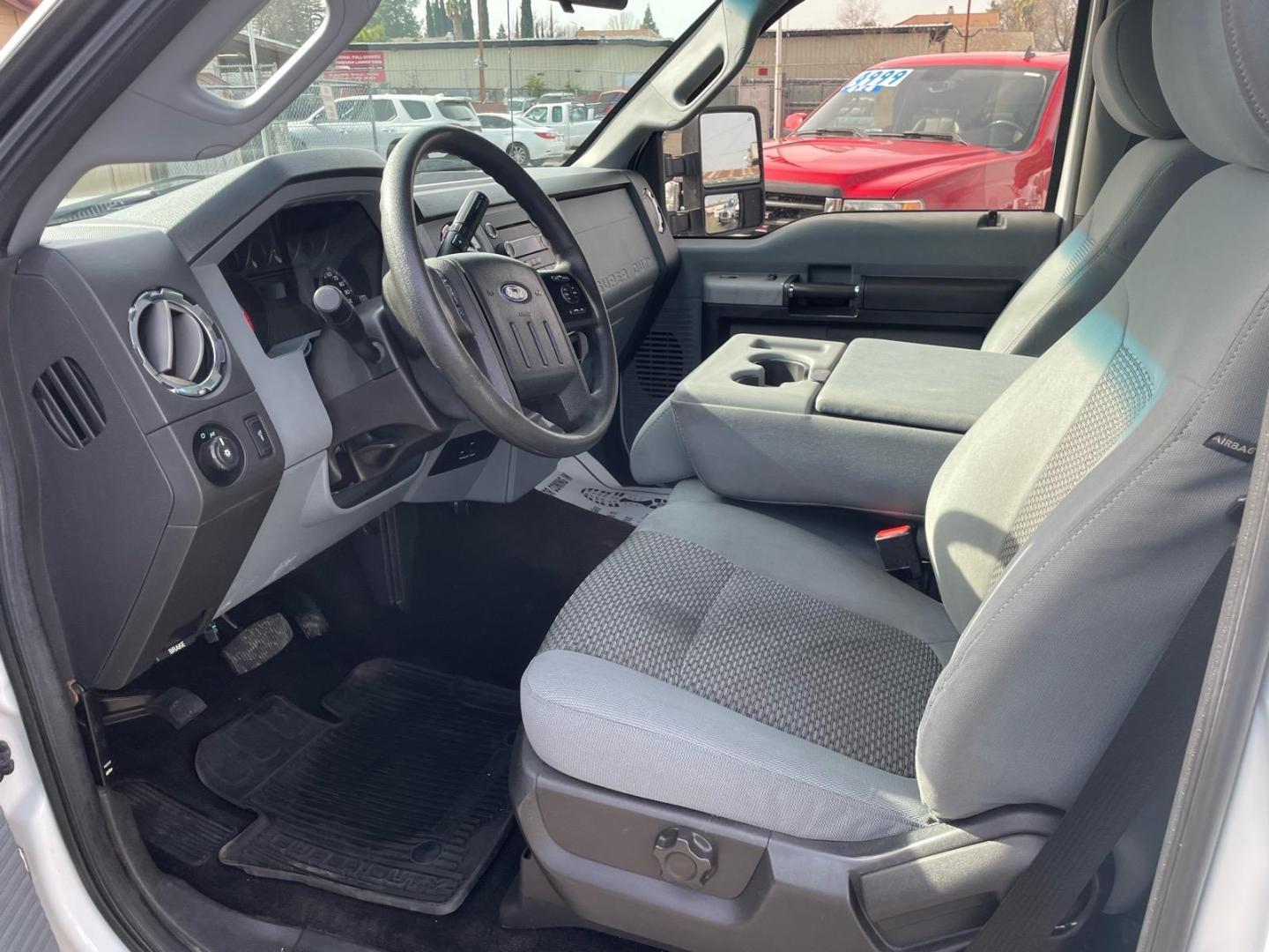 2013 Oxford White Ford F-350 Super Duty XLT (1FDBF3A67DE) with an 6.2L 6.2L Flex Fuel V8 385hp 405ft. lbs. Sequential Electronic Fuel Injection engine, 6-Speed Shiftable Automatic transmission, located at 800 Riverside Ave, Roseville, CA, 95678, 916-773-4549 & Toll Free: 866-719-4393, 38.732265, -121.291039 - FLATBED XLT SERVICE RECORDS ON CLEAN CARFAX - Photo#5
