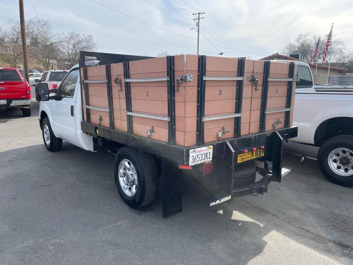 2013 Oxford White Ford F-350 Super Duty XLT (1FDBF3A67DE) with an 6.2L 6.2L Flex Fuel V8 385hp 405ft. lbs. Sequential Electronic Fuel Injection engine, 6-Speed Shiftable Automatic transmission, located at 800 Riverside Ave, Roseville, CA, 95678, 916-773-4549 & Toll Free: 866-719-4393, 38.732265, -121.291039 - FLATBED XLT SERVICE RECORDS ON CLEAN CARFAX - Photo#13