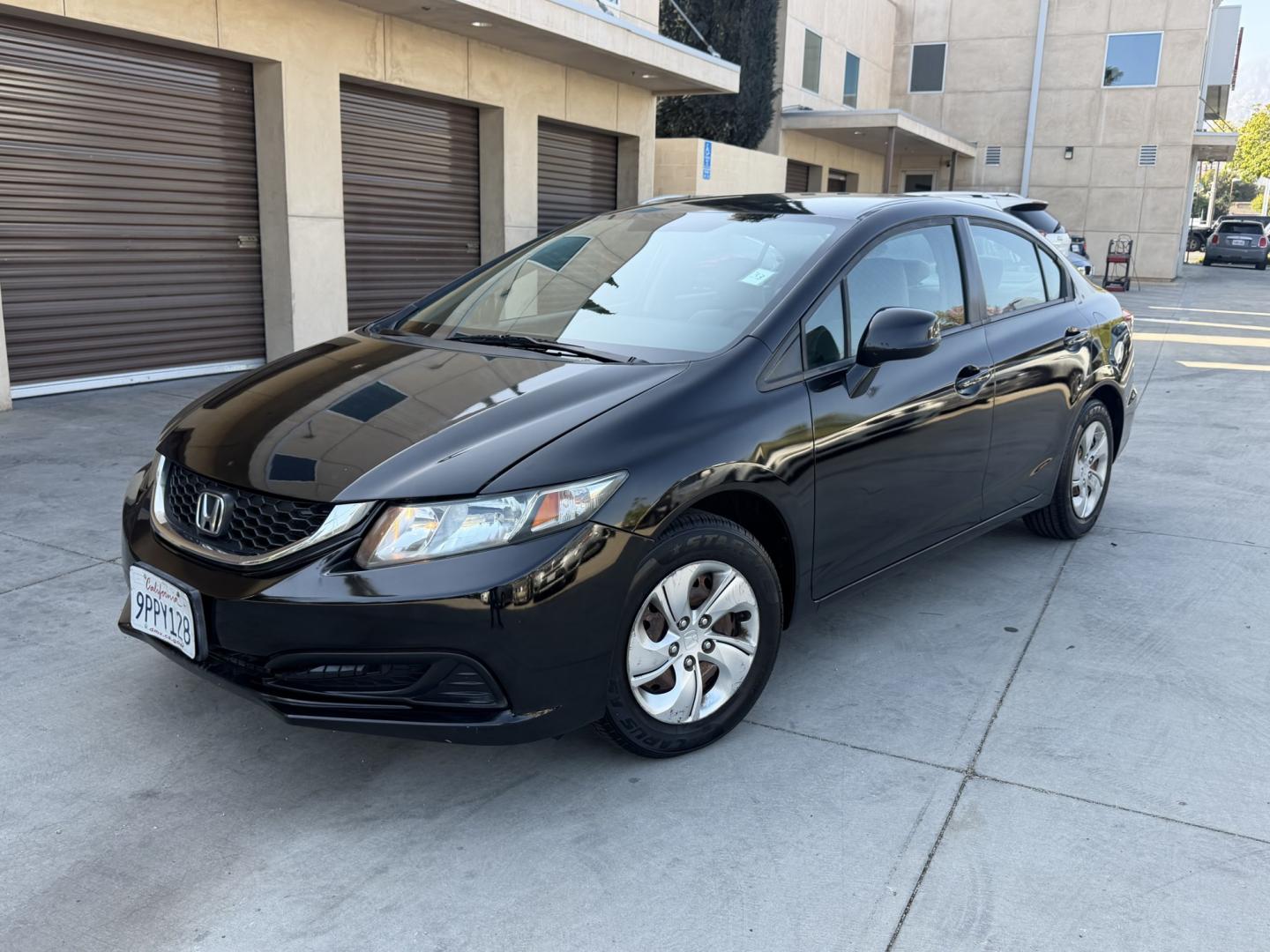 2013 Black /Grey Honda Civic LX Sedan 5-Speed AT (19XFB2F53DE) with an 1.8L L4 SOHC 16V engine, 5-Speed Automatic transmission, located at 30 S. Berkeley Avenue, Pasadena, CA, 91107, (626) 248-7567, 34.145447, -118.109398 - 2013 Honda Civic LX Sedan for Sale in Pasadena, California – Easy Financing Available Looking for a reliable used Honda Civic for sale in Pasadena, California? This 2013 Honda Civic LX Sedan offers the perfect combination of fuel economy, reliability, affordability, and Honda's legendary reputa - Photo#0