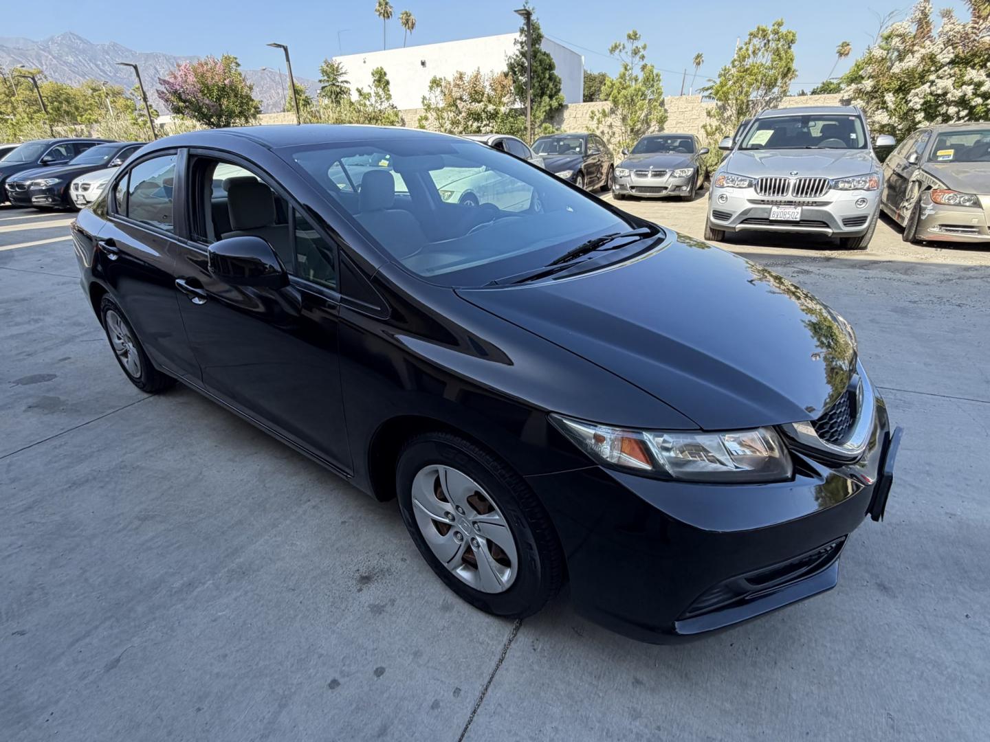 2013 Black /Grey Honda Civic LX Sedan 5-Speed AT (19XFB2F53DE) with an 1.8L L4 SOHC 16V engine, 5-Speed Automatic transmission, located at 30 S. Berkeley Avenue, Pasadena, CA, 91107, (626) 248-7567, 34.145447, -118.109398 - 2013 Honda Civic LX Sedan for Sale in Pasadena, California – Easy Financing Available Looking for a reliable used Honda Civic for sale in Pasadena, California? This 2013 Honda Civic LX Sedan offers the perfect combination of fuel economy, reliability, affordability, and Honda's legendary reputa - Photo#6