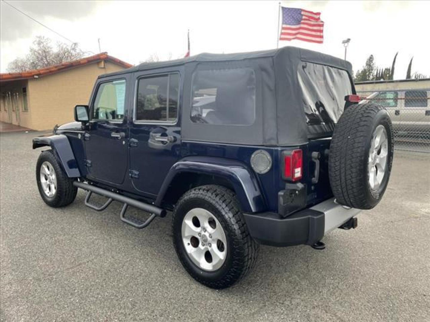 2013 True Blue Pearl Coat Jeep Wrangler Unlimited Sahara (1C4BJWEG7DL) with an 3.6L 3.6L V6 285hp 260ft. lbs. Sequential Multiport Fuel Injection engine, 5-Speed Automatic transmission, located at 800 Riverside Ave, Roseville, CA, 95678, 916-773-4549 & Toll Free: 866-719-4393, 38.732265, -121.291039 - 4X4 UMLIMITED SAHARA NEW SOFT TOP NEW TIRES - Photo#2