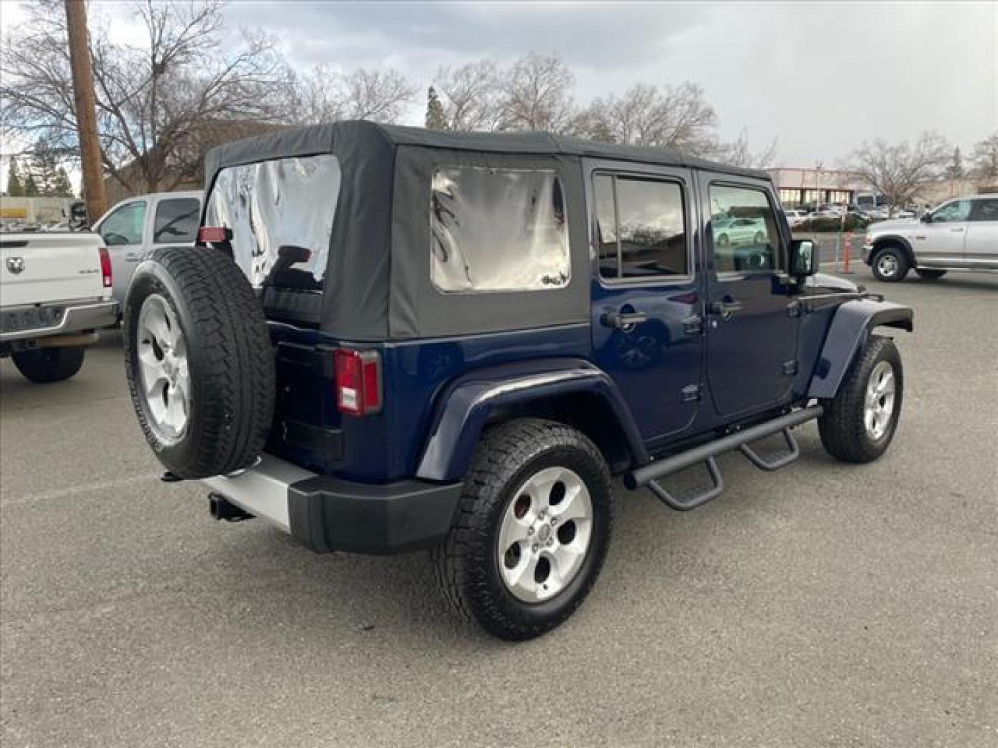 2013 True Blue Pearl Coat Jeep Wrangler Unlimited Sahara (1C4BJWEG7DL) with an 3.6L 3.6L V6 285hp 260ft. lbs. Sequential Multiport Fuel Injection engine, 5-Speed Automatic transmission, located at 800 Riverside Ave, Roseville, CA, 95678, 916-773-4549 & Toll Free: 866-719-4393, 38.732265, -121.291039 - 4X4 UMLIMITED SAHARA NEW SOFT TOP NEW TIRES - Photo#3