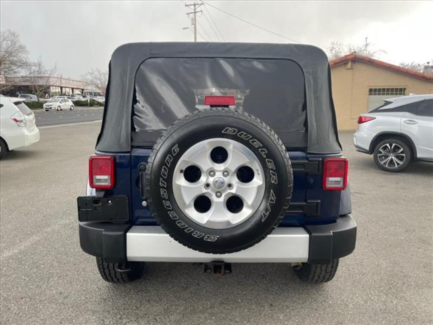 2013 True Blue Pearl Coat Jeep Wrangler Unlimited Sahara (1C4BJWEG7DL) with an 3.6L 3.6L V6 285hp 260ft. lbs. Sequential Multiport Fuel Injection engine, 5-Speed Automatic transmission, located at 800 Riverside Ave, Roseville, CA, 95678, 916-773-4549 & Toll Free: 866-719-4393, 38.732265, -121.291039 - 4X4 UMLIMITED SAHARA NEW SOFT TOP NEW TIRES - Photo#8