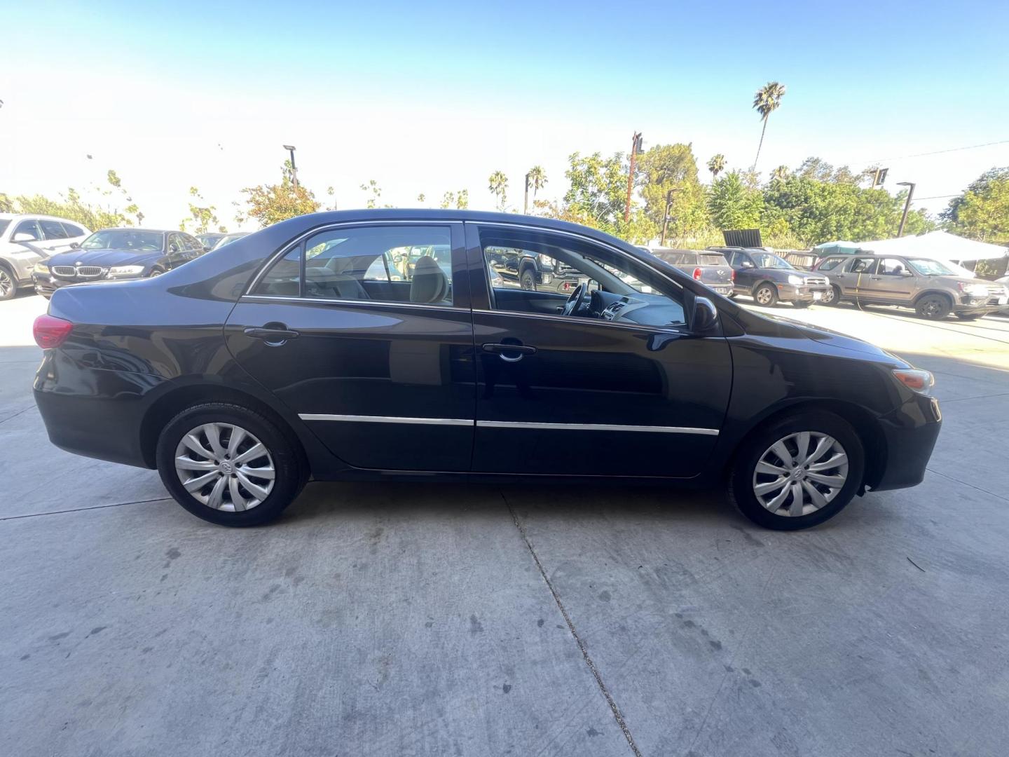2013 Black /Black Toyota Corolla LE 4-Speed AT (5YFBU4EE0DP) with an 1.8L L4 DOHC 16V engine, 4-Speed Automatic transmission, located at 30 S. Berkeley Avenue, Pasadena, CA, 91107, (626) 248-7567, 34.145447, -118.109398 - Buy Here Pay Here Pasadena – 2013 Toyota Corolla LE | $500 Down Financing Available | Bad Credit OK Looking for a reliable, fuel-efficient, and affordable vehicle in Pasadena, CA? Crown City Motors has the perfect solution for you with our 2013 Toyota Corolla LE, available now with Buy Here Pay - Photo#5