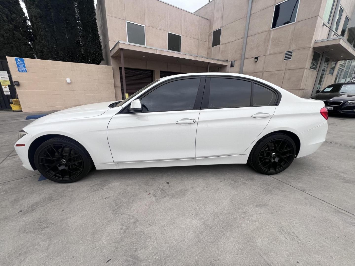2014 Alpine White /Black BMW 3-Series 320i Sedan (WBA3C3G53EN) with an 2.0L L4 DOHC 16V engine, Automatic transmission, located at 30 S. Berkeley Avenue, Pasadena, CA, 91107, (626) 248-7567, 34.145447, -118.109398 - Experience luxury, performance, and affordability with this stunning 2014 BMW 320i, a vehicle that perfectly blends style, power, and advanced technology. Whether you're looking for a reliable commuter car or a sophisticated ride for your weekend adventures, the 2014 BMW 320i has you covered. And wi - Photo#10