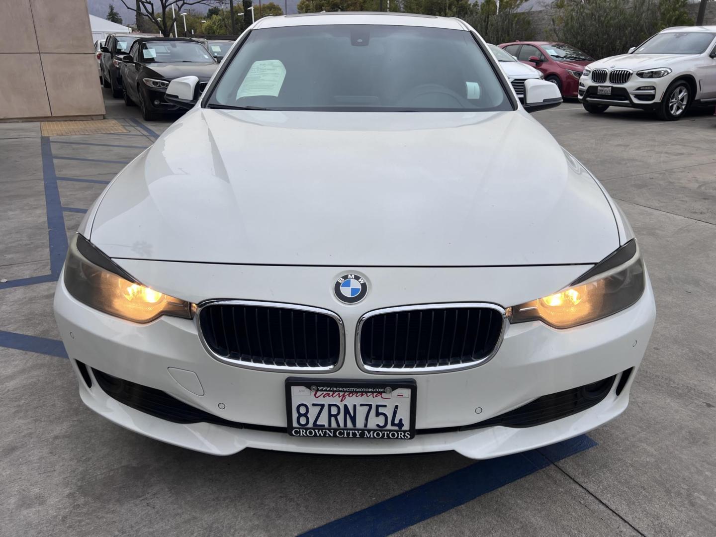 2014 Alpine White /Black BMW 3-Series 320i Sedan (WBA3C3G53EN) with an 2.0L L4 DOHC 16V engine, Automatic transmission, located at 30 S. Berkeley Avenue, Pasadena, CA, 91107, (626) 248-7567, 34.145447, -118.109398 - Experience luxury, performance, and affordability with this stunning 2014 BMW 320i, a vehicle that perfectly blends style, power, and advanced technology. Whether you're looking for a reliable commuter car or a sophisticated ride for your weekend adventures, the 2014 BMW 320i has you covered. And wi - Photo#13