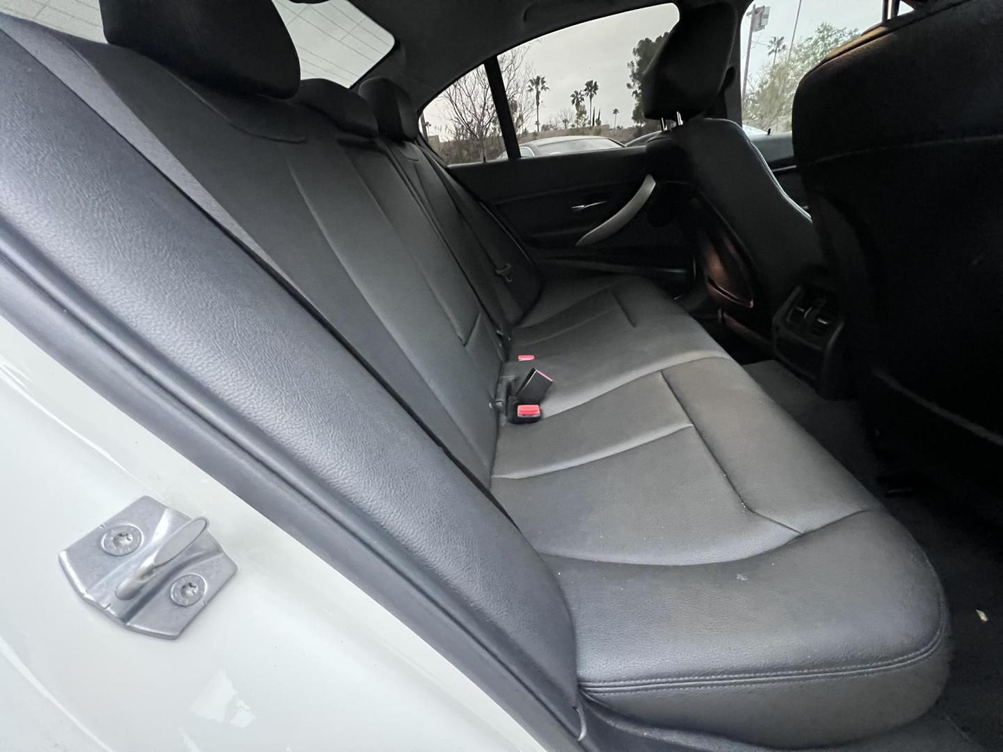 2014 Alpine White /Black BMW 3-Series 320i Sedan (WBA3C3G53EN) with an 2.0L L4 DOHC 16V engine, Automatic transmission, located at 30 S. Berkeley Avenue, Pasadena, CA, 91107, (626) 248-7567, 34.145447, -118.109398 - Experience luxury, performance, and affordability with this stunning 2014 BMW 320i, a vehicle that perfectly blends style, power, and advanced technology. Whether you're looking for a reliable commuter car or a sophisticated ride for your weekend adventures, the 2014 BMW 320i has you covered. And wi - Photo#28