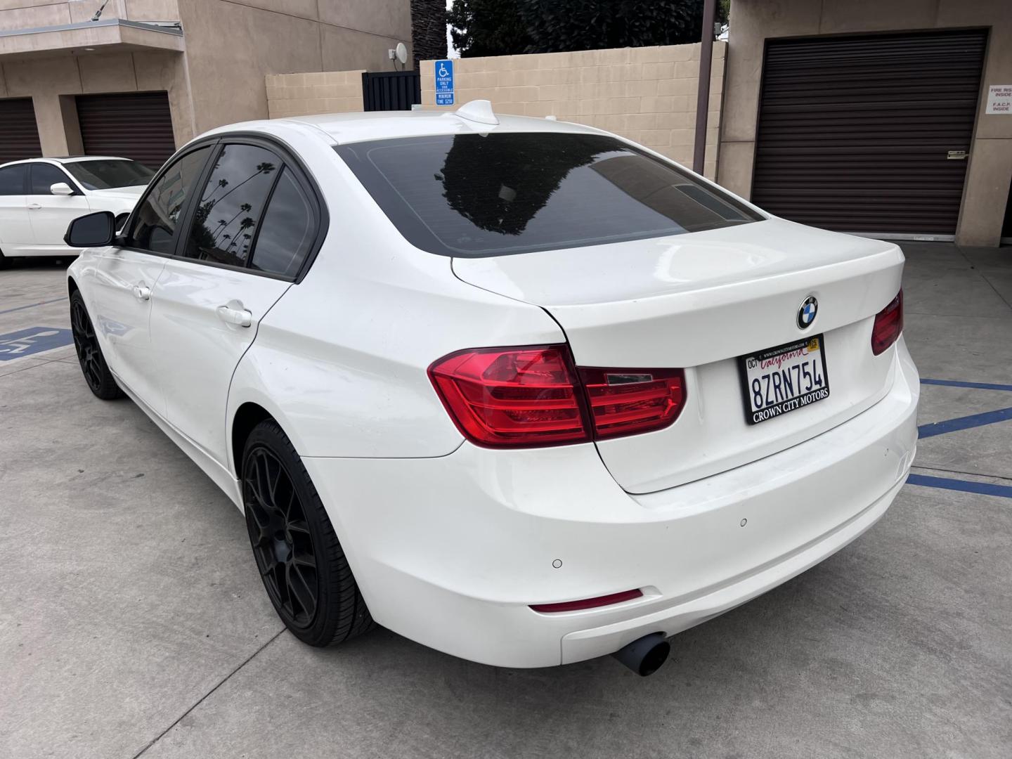 2014 Alpine White /Black BMW 3-Series 320i Sedan (WBA3C3G53EN) with an 2.0L L4 DOHC 16V engine, Automatic transmission, located at 30 S. Berkeley Avenue, Pasadena, CA, 91107, (626) 248-7567, 34.145447, -118.109398 - Experience luxury, performance, and affordability with this stunning 2014 BMW 320i, a vehicle that perfectly blends style, power, and advanced technology. Whether you're looking for a reliable commuter car or a sophisticated ride for your weekend adventures, the 2014 BMW 320i has you covered. And wi - Photo#9