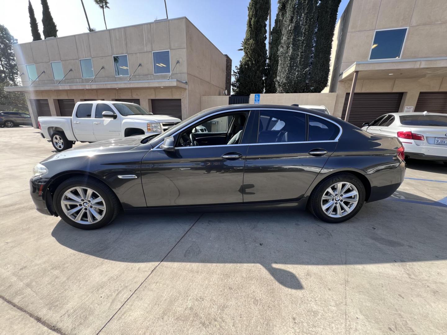 2014 Black /Black BMW 5-Series 528i (WBA5A5C55ED) with an 2.0L L4 DOHC 16V TURBO engine, 8-Speed Automatic transmission, located at 30 S. Berkeley Avenue, Pasadena, CA, 91107, (626) 248-7567, 34.145447, -118.109398 - New Tires! Navigation! Back-up camera! 2014 BMW 528 - Buy Here Pay Here Dealer - Bad Credit Used Car Auto Financing Discover the elegance and performance of the 2014 BMW 528 at our dealership, where luxury meets affordability. This sleek sedan is loaded with premium features to enhance your dri - Photo#1