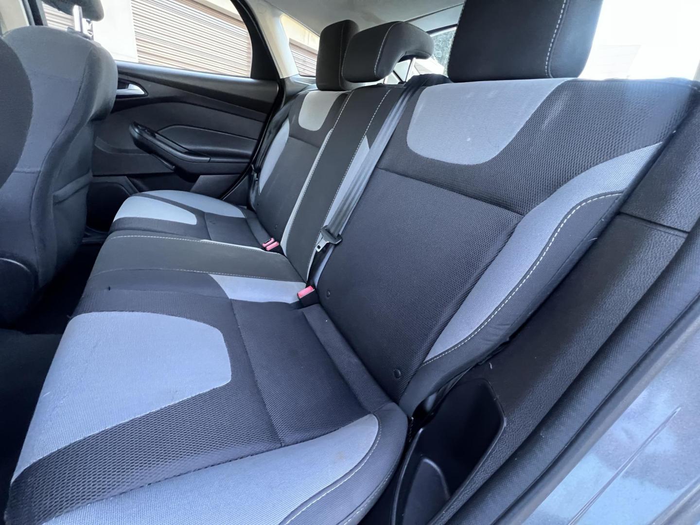 2014 Gray /Balck Ford Focus SE Hatch (1FADP3K21EL) with an 2.0L L4 DOHC 16V engine, Automatic transmission, located at 30 S. Berkeley Avenue, Pasadena, CA, 91107, (626) 248-7567, 34.145447, -118.109398 - Microsoft Sync! Moon-roof! This 2014 Ford Focus SE Hatch looks and drives good. Bad credit? We can help! We are the bank. - Photo#16