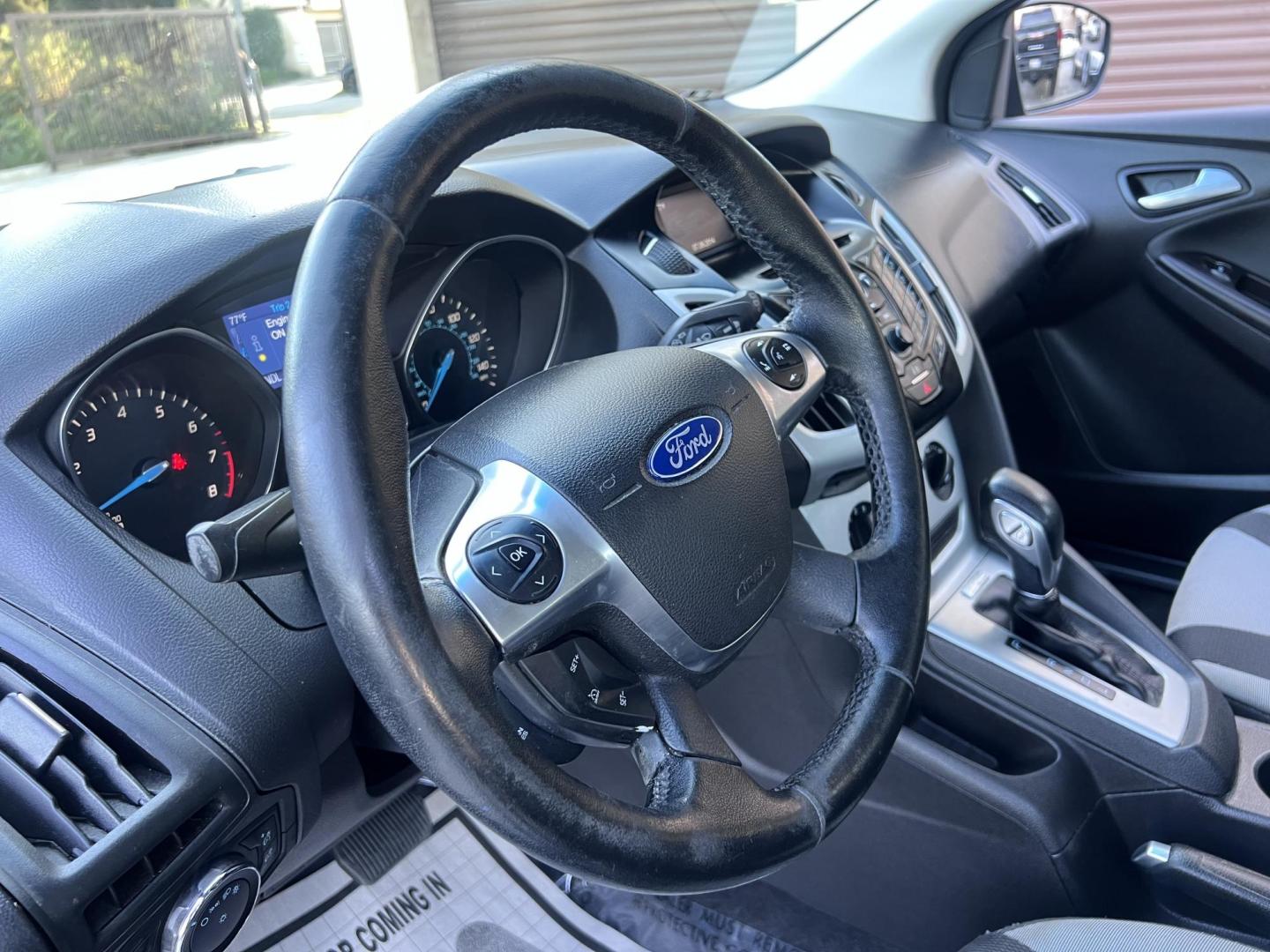 2014 Gray /Balck Ford Focus SE Hatch (1FADP3K21EL) with an 2.0L L4 DOHC 16V engine, Automatic transmission, located at 30 S. Berkeley Avenue, Pasadena, CA, 91107, (626) 248-7567, 34.145447, -118.109398 - Microsoft Sync! Moon-roof! This 2014 Ford Focus SE Hatch looks and drives good. Bad credit? We can help! We are the bank. - Photo#18