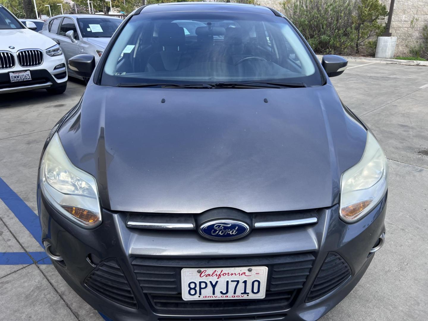 2014 Gray /Balck Ford Focus SE Hatch (1FADP3K21EL) with an 2.0L L4 DOHC 16V engine, Automatic transmission, located at 30 S. Berkeley Avenue, Pasadena, CA, 91107, (626) 248-7567, 34.145447, -118.109398 - Microsoft Sync! Moon-roof! This 2014 Ford Focus SE Hatch looks and drives good. Bad credit? We can help! We are the bank. - Photo#6