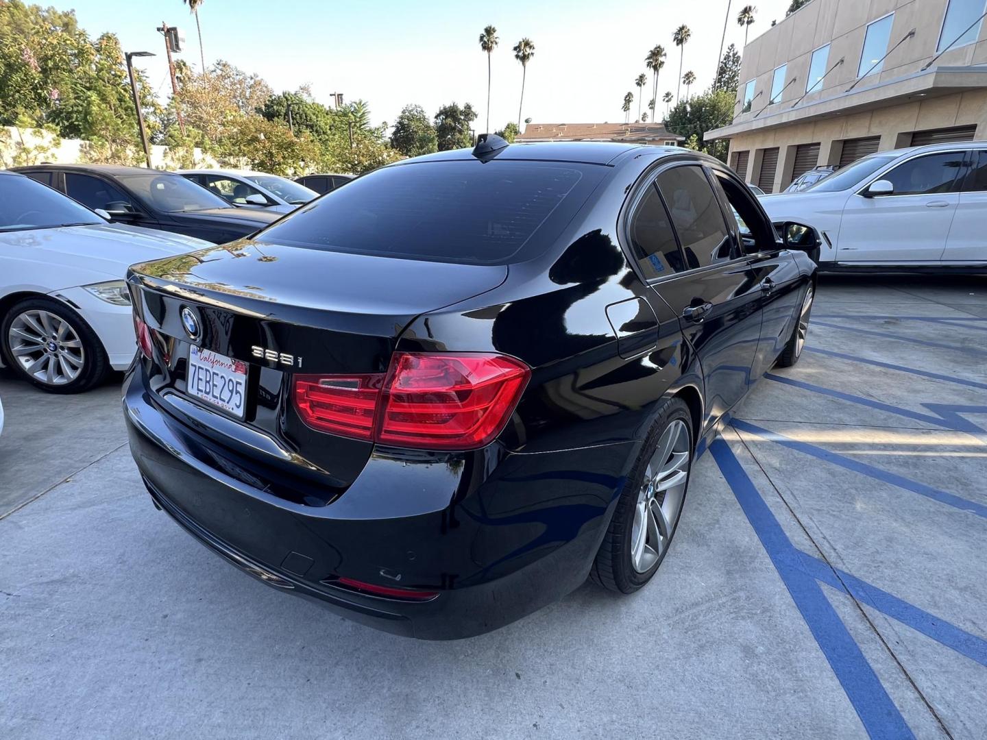 2014 Black /black BMW 3-Series 328i Sedan (WBA3A5C57EP) with an 2.0L L4 DOHC 16V engine, automatic transmission, located at 30 S. Berkeley Avenue, Pasadena, CA, 91107, (626) 248-7567, 34.145447, -118.109398 - Crown City Motors is a used “Buy Here Pay Here” car dealer in Pasadena CA. “Buy Here Pay Here” financing, means that when you purchase your vehicle from our dealership, that you make the payments to the dealership as well. We do not need the banks approval to get you approved for a used auto - Photo#2