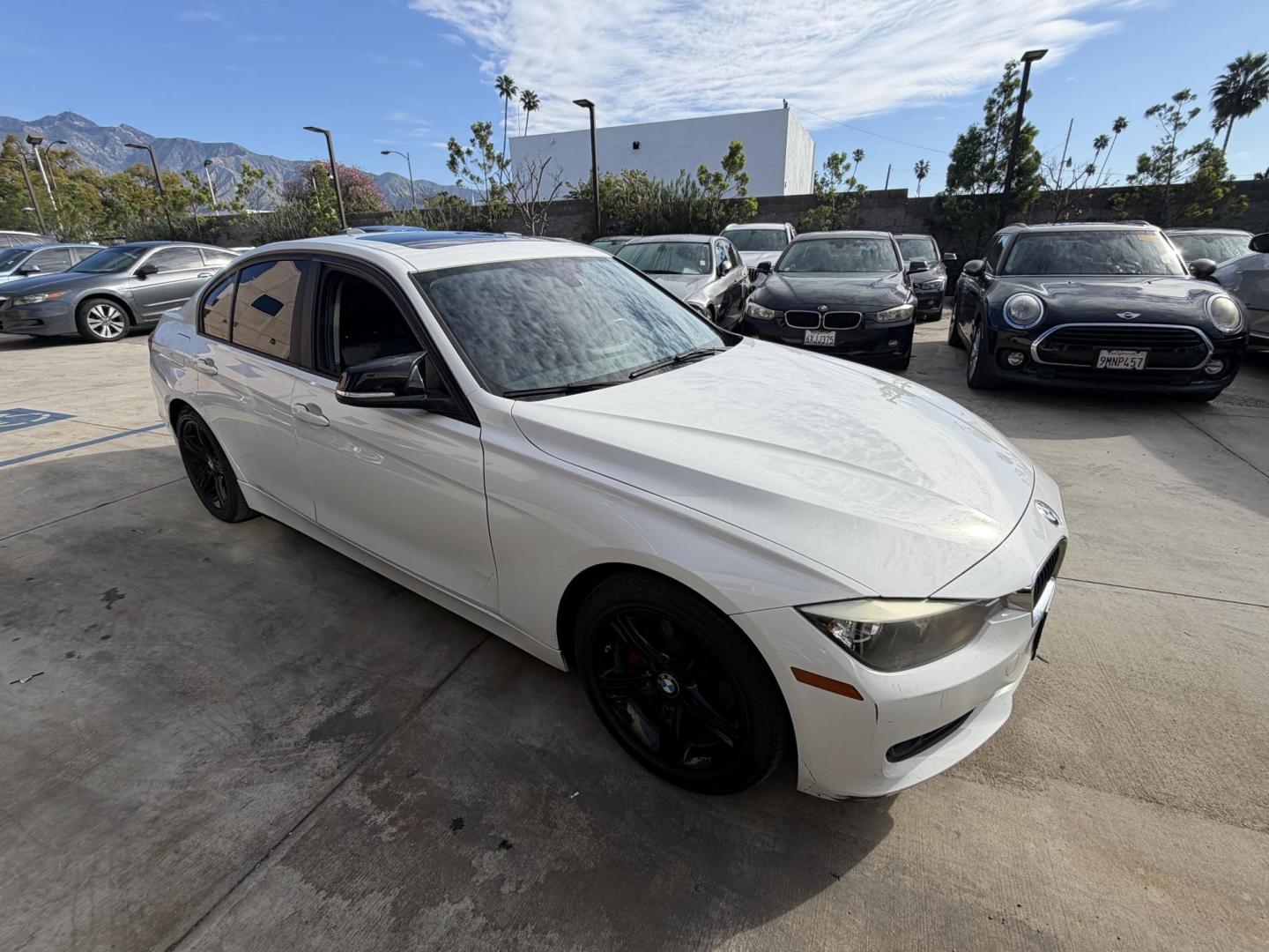 2014 White /Black BMW 3-Series 328i Sedan (WBA3C1C55EK) with an 2.0L L4 DOHC 16V engine, Automatic transmission, located at 30 S. Berkeley Avenue, Pasadena, CA, 91107, (626) 248-7567, 34.145447, -118.109398 - 2014 BMW 3 Series – White – Buy Here Pay Here Financing – Pasadena, CA VIN: WBA3C1C55EK114554 Looking for a white BMW 3 Series with easy financing in Pasadena? This 2014 BMW 3 Series (VIN: WBA3C1C55EK114554) offers luxury, performance, and affordability — with in-house financing design - Photo#3