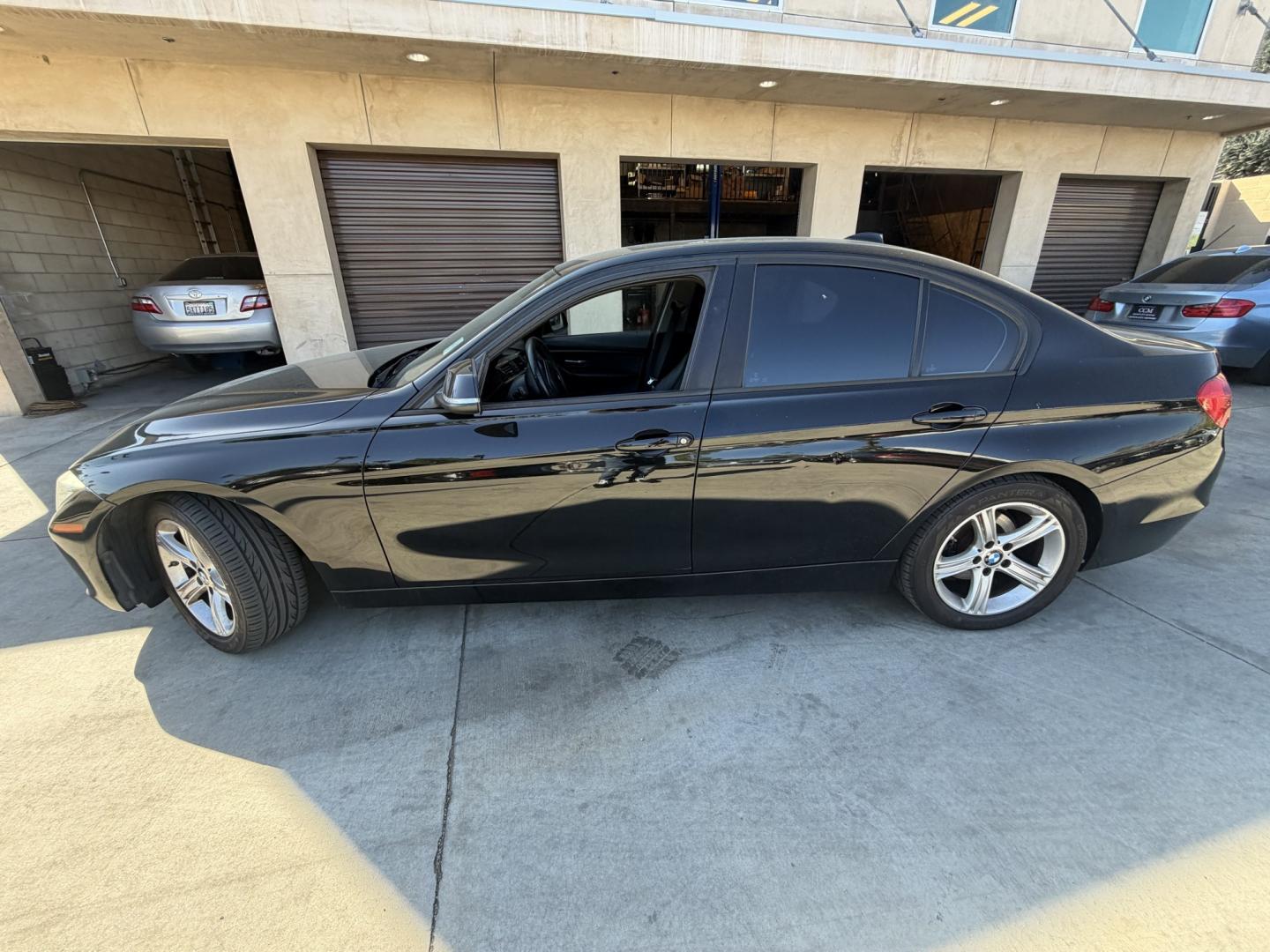 2014 Black /Black BMW 3-Series 328i Sedan (WBA3A5G51EN) with an 2.0L L4 DOHC 16V engine, located at 30 S. Berkeley Avenue, Pasadena, CA, 91107, (626) 248-7567, 34.145447, -118.109398 - Photo#2