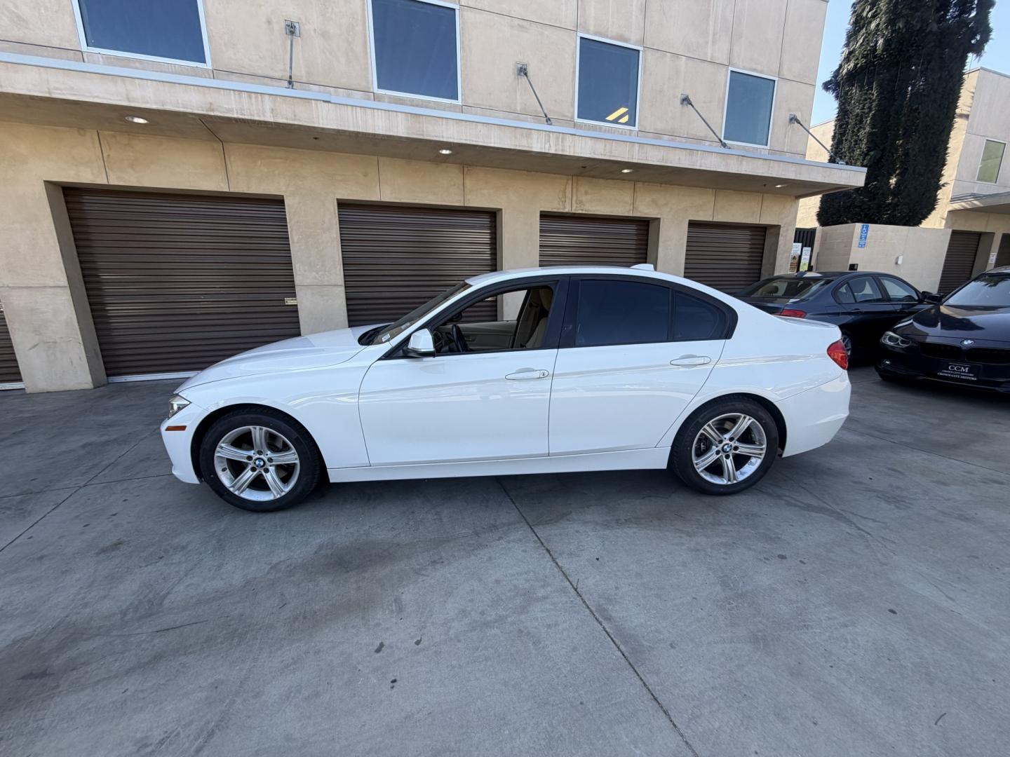 2014 Alpine White /Black BMW 3-Series 328i Sedan (WBA3C1C51EK) with an 2.0L L4 DOHC 16V engine, Automatic transmission, located at 30 S. Berkeley Avenue, Pasadena, CA, 91107, (626) 248-7567, 34.145447, -118.109398 - Drive a 2014 BMW 3 Series Today – Luxury, Performance and Easy Financing at Crown City Motors If you’re looking for a vehicle that perfectly blends luxury, performance, and everyday reliability, this 2014 BMW 3 Series is exactly what you need. Known worldwide for its engineering excellence, - Photo#4