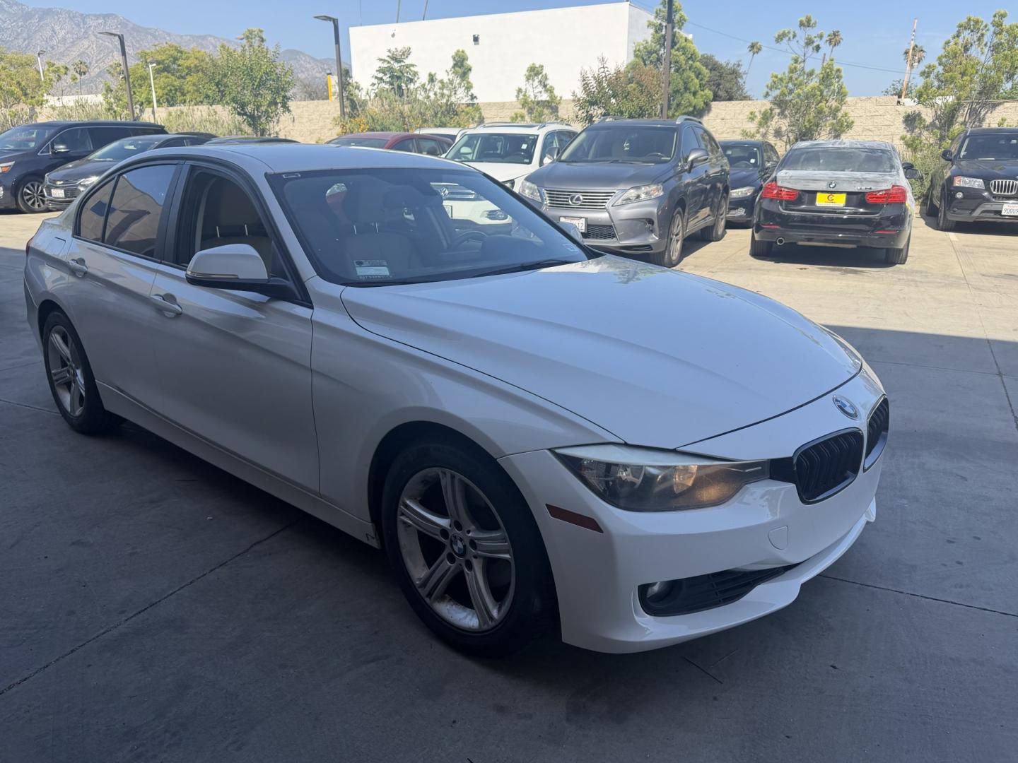 2014 Alpine White /Black BMW 3-Series 328i Sedan (WBA3C1C51EK) with an 2.0L L4 DOHC 16V engine, Automatic transmission, located at 30 S. Berkeley Avenue, Pasadena, CA, 91107, (626) 248-7567, 34.145447, -118.109398 - Drive a 2014 BMW 3 Series Today – Luxury, Performance and Easy Financing at Crown City Motors If you’re looking for a vehicle that perfectly blends luxury, performance, and everyday reliability, this 2014 BMW 3 Series is exactly what you need. Known worldwide for its engineering excellence, - Photo#7