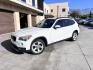 2014 White /beige BMW X1 sDrive28i (WBAVM1C50EV) with an 2.0L L4 DOHC 16V engine, 8-Speed Automatic transmission, located at 30 S. Berkeley Avenue, Pasadena, CA, 91107, (626) 248-7567, 34.145447, -118.109398 - Crown City Motors is a used “Buy Here Pay Here” car dealer in Pasadena CA. “Buy Here Pay Here” financing, means that when you purchase your vehicle from our dealership, that you make the payments to the dealership as well. We do not need the banks approval to get you approved for a used auto - Photo#0