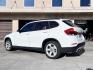 2014 White /beige BMW X1 sDrive28i (WBAVM1C50EV) with an 2.0L L4 DOHC 16V engine, 8-Speed Automatic transmission, located at 30 S. Berkeley Avenue, Pasadena, CA, 91107, (626) 248-7567, 34.145447, -118.109398 - Crown City Motors is a used “Buy Here Pay Here” car dealer in Pasadena CA. “Buy Here Pay Here” financing, means that when you purchase your vehicle from our dealership, that you make the payments to the dealership as well. We do not need the banks approval to get you approved for a used auto - Photo#2