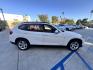 2014 White /beige BMW X1 sDrive28i (WBAVM1C50EV) with an 2.0L L4 DOHC 16V engine, 8-Speed Automatic transmission, located at 30 S. Berkeley Avenue, Pasadena, CA, 91107, (626) 248-7567, 34.145447, -118.109398 - Crown City Motors is a used “Buy Here Pay Here” car dealer in Pasadena CA. “Buy Here Pay Here” financing, means that when you purchase your vehicle from our dealership, that you make the payments to the dealership as well. We do not need the banks approval to get you approved for a used auto - Photo#6