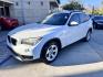 2014 White /beige BMW X1 sDrive28i (WBAVM1C50EV) with an 2.0L L4 DOHC 16V engine, 8-Speed Automatic transmission, located at 30 S. Berkeley Avenue, Pasadena, CA, 91107, (626) 248-7567, 34.145447, -118.109398 - Crown City Motors is a used “Buy Here Pay Here” car dealer in Pasadena CA. “Buy Here Pay Here” financing, means that when you purchase your vehicle from our dealership, that you make the payments to the dealership as well. We do not need the banks approval to get you approved for a used auto - Photo#4