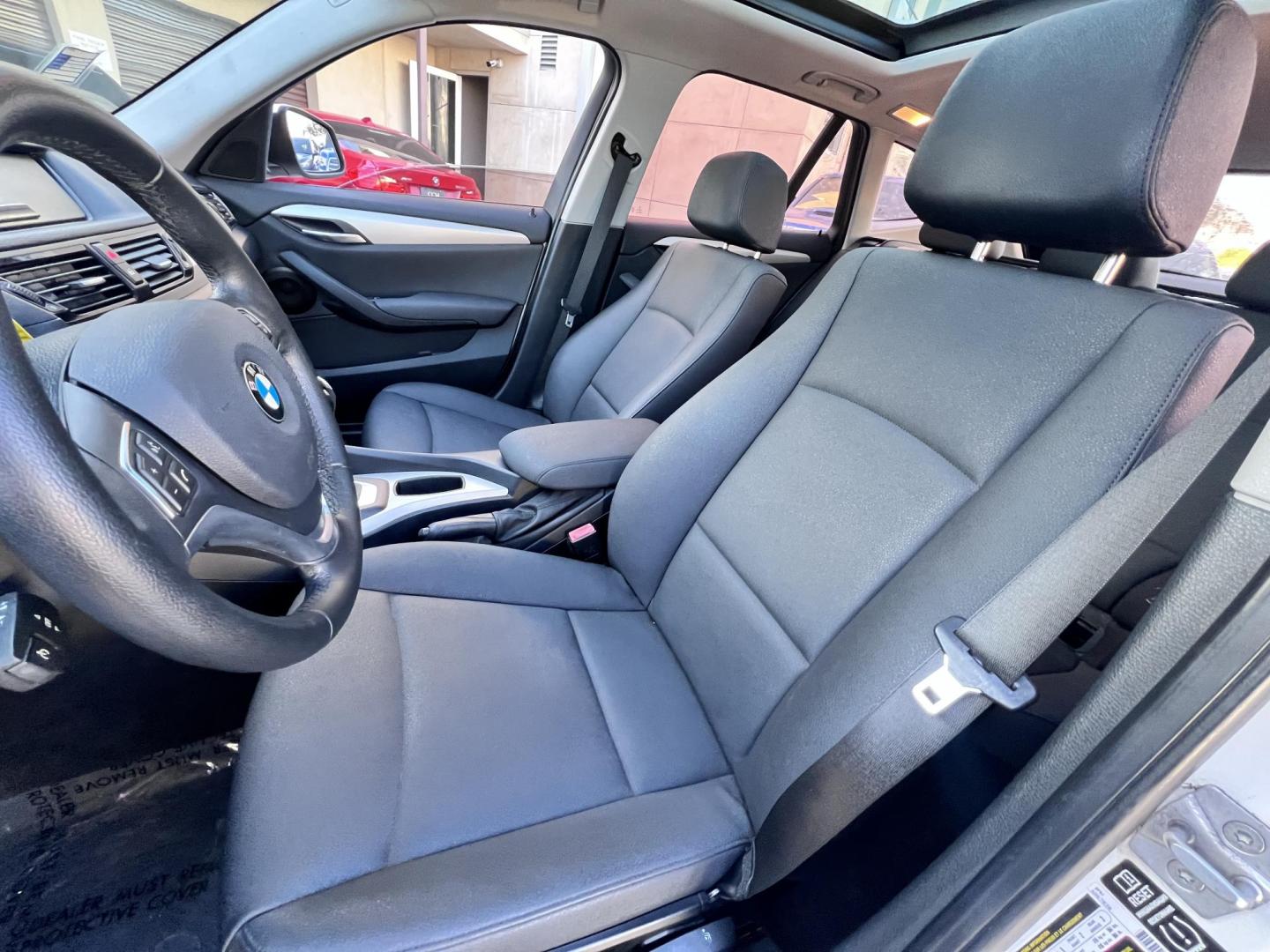 2014 White /beige BMW X1 sDrive28i (WBAVM1C50EV) with an 2.0L L4 DOHC 16V engine, 8-Speed Automatic transmission, located at 30 S. Berkeley Avenue, Pasadena, CA, 91107, (626) 248-7567, 34.145447, -118.109398 - Crown City Motors is a used “Buy Here Pay Here” car dealer in Pasadena CA. “Buy Here Pay Here” financing, means that when you purchase your vehicle from our dealership, that you make the payments to the dealership as well. We do not need the banks approval to get you approved for a used auto - Photo#13