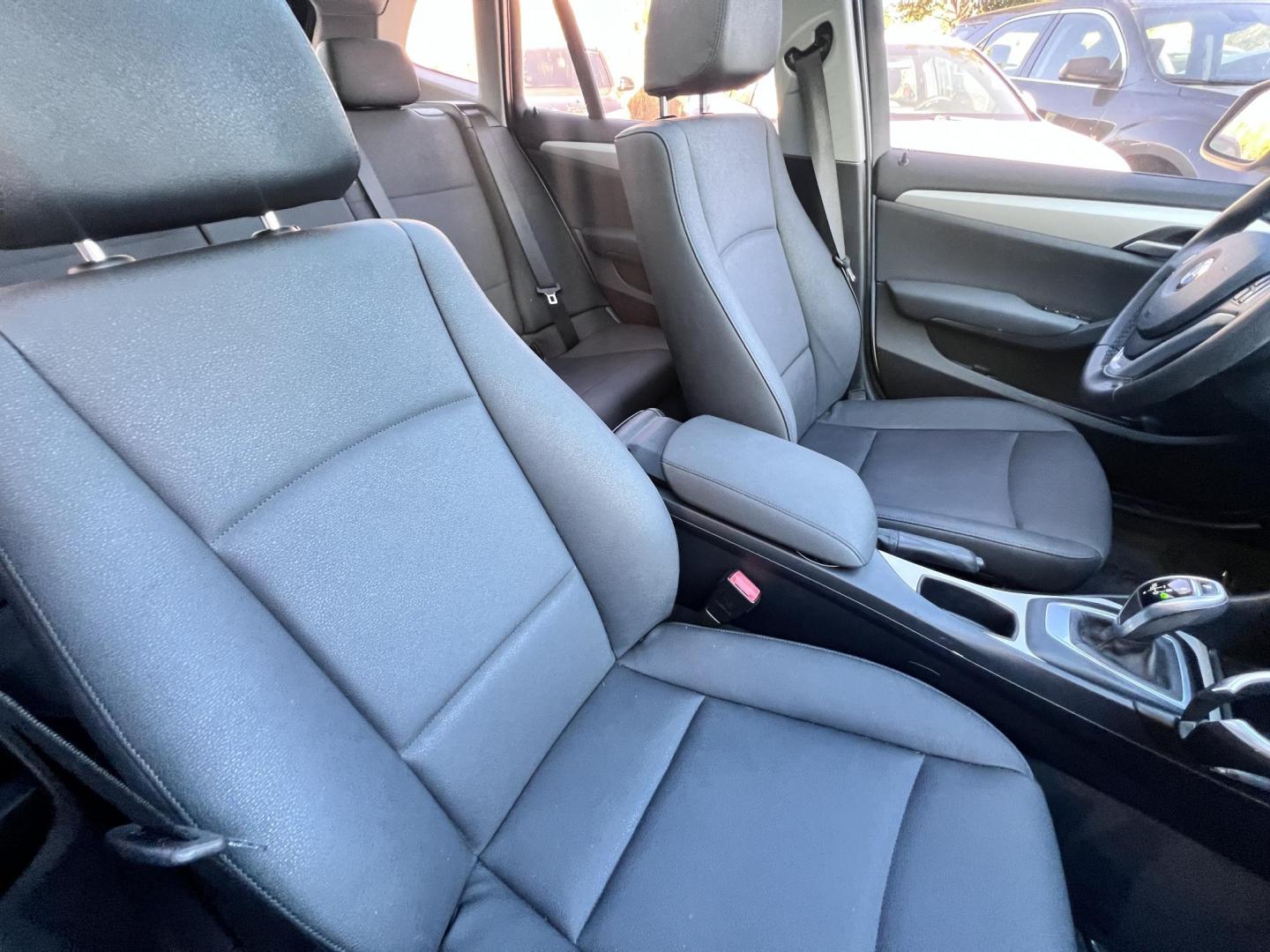 2014 White /beige BMW X1 sDrive28i (WBAVM1C50EV) with an 2.0L L4 DOHC 16V engine, 8-Speed Automatic transmission, located at 30 S. Berkeley Avenue, Pasadena, CA, 91107, (626) 248-7567, 34.145447, -118.109398 - Crown City Motors is a used “Buy Here Pay Here” car dealer in Pasadena CA. “Buy Here Pay Here” financing, means that when you purchase your vehicle from our dealership, that you make the payments to the dealership as well. We do not need the banks approval to get you approved for a used auto - Photo#15