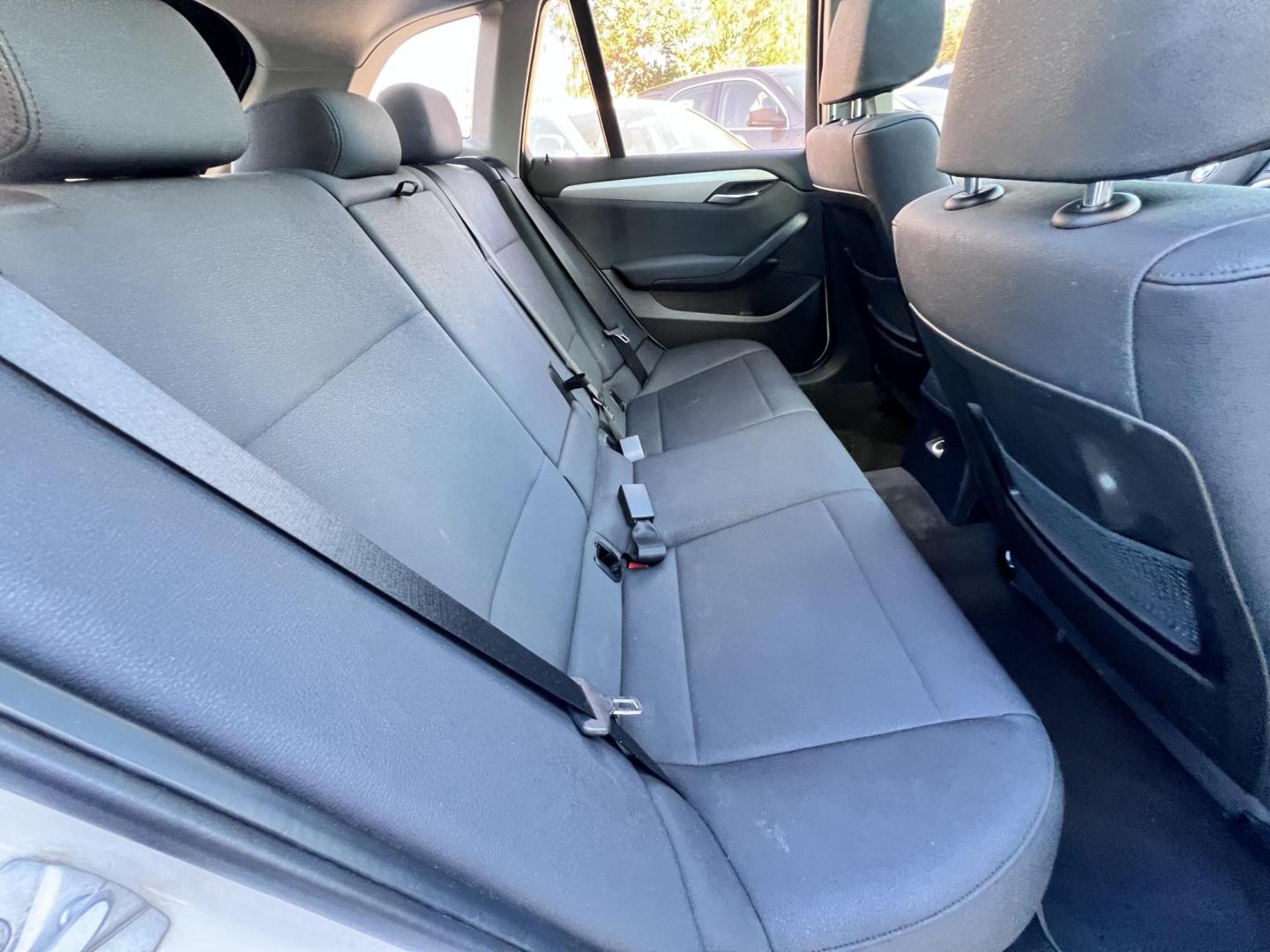 2014 White /beige BMW X1 sDrive28i (WBAVM1C50EV) with an 2.0L L4 DOHC 16V engine, 8-Speed Automatic transmission, located at 30 S. Berkeley Avenue, Pasadena, CA, 91107, (626) 248-7567, 34.145447, -118.109398 - Crown City Motors is a used “Buy Here Pay Here” car dealer in Pasadena CA. “Buy Here Pay Here” financing, means that when you purchase your vehicle from our dealership, that you make the payments to the dealership as well. We do not need the banks approval to get you approved for a used auto - Photo#19