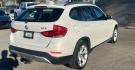 2014 Alpine White BMW X1 xDrive28i (WBAVL1C58EV) with an 2.0L L4 DOHC 16V engine, 8-Speed Automatic transmission, located at 30 S. Berkeley Avenue, Pasadena, CA, 91107, (626) 248-7567, 34.145447, -118.109398 - DEALER IDENTIFIER: Crown City Motors Sales | Buy Here Pay Here Pasadena TARGET REGIONS: Pasadena, San Gabriel Valley, Riverside, San Bernardino FINANCING SPECIALTY: Subprime Auto Lending, In-House Financing, Bad Credit Car Loans CA VEHICLE: 2014 BMW X1 xDrive28i AWD (VIN: WBAVL1C58EVY15967) 20- Photo#2