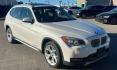 2014 Alpine White BMW X1 xDrive28i (WBAVL1C58EV) with an 2.0L L4 DOHC 16V engine, 8-Speed Automatic transmission, located at 30 S. Berkeley Avenue, Pasadena, CA, 91107, (626) 248-7567, 34.145447, -118.109398 - DEALER IDENTIFIER: Crown City Motors Sales | Buy Here Pay Here Pasadena TARGET REGIONS: Pasadena, San Gabriel Valley, Riverside, San Bernardino FINANCING SPECIALTY: Subprime Auto Lending, In-House Financing, Bad Credit Car Loans CA VEHICLE: 2014 BMW X1 xDrive28i AWD (VIN: WBAVL1C58EVY15967) 20- Photo#0