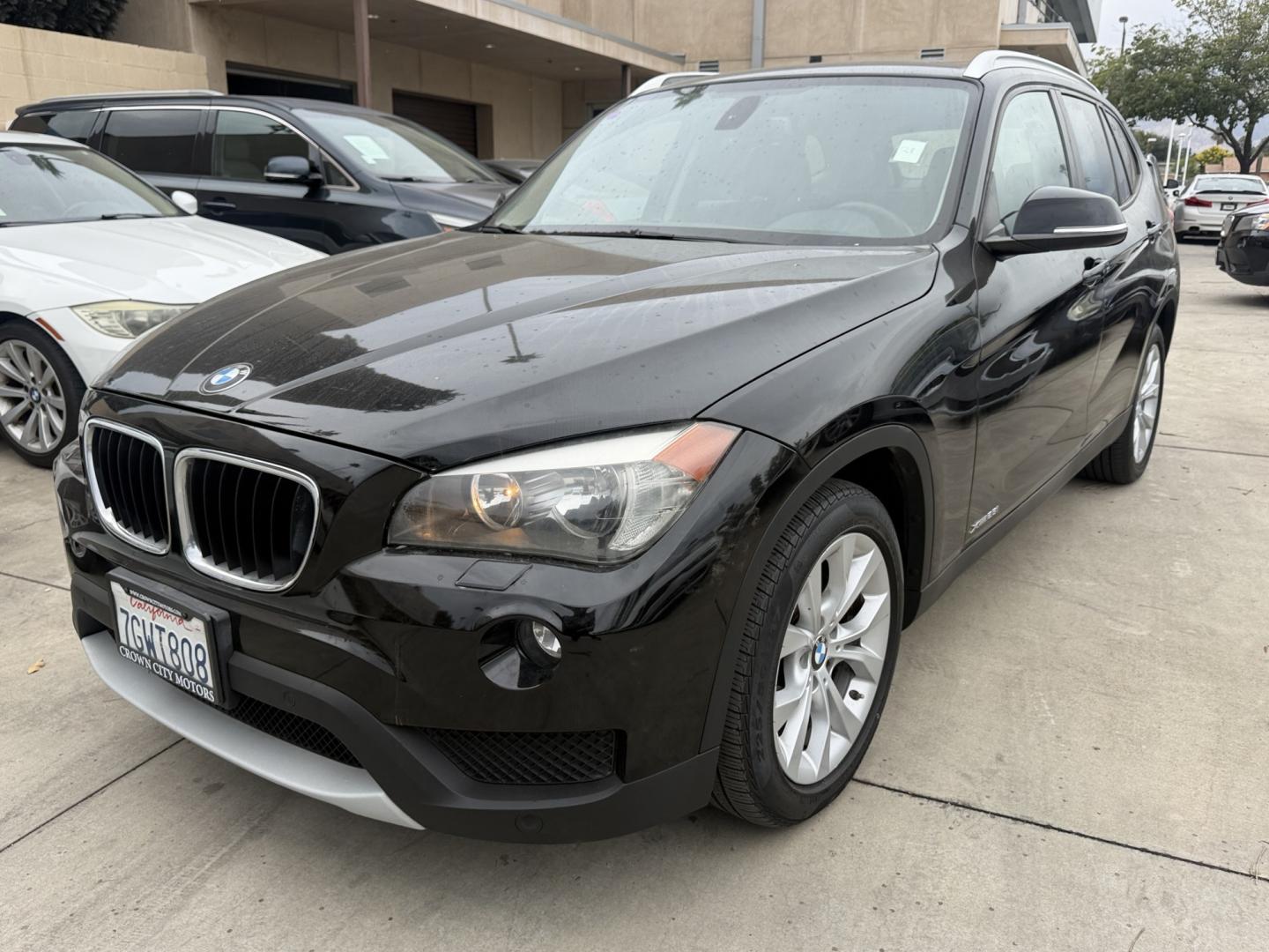 2014 Black /Black BMW X1 xDrive28i (WBAVL1C51EV) with an 2.0L L4 DOHC 16V engine, 8-Speed Automatic transmission, located at 30 S. Berkeley Avenue, Pasadena, CA, 91107, (626) 248-7567, 34.145447, -118.109398 - 2014 BMW X1 sDrive28i (Black on Black) – Pasadena Buy Here Pay Here | In-House Financing and Guaranteed Approval List Price: $7,795 | Dealer Document Fee: +$85.00 | Electronic Filing Fee: +$37.00 | Crown City Motors Price: $7,917 Drive today with bad credit, no credit, repossession, or bankr- Photo#0