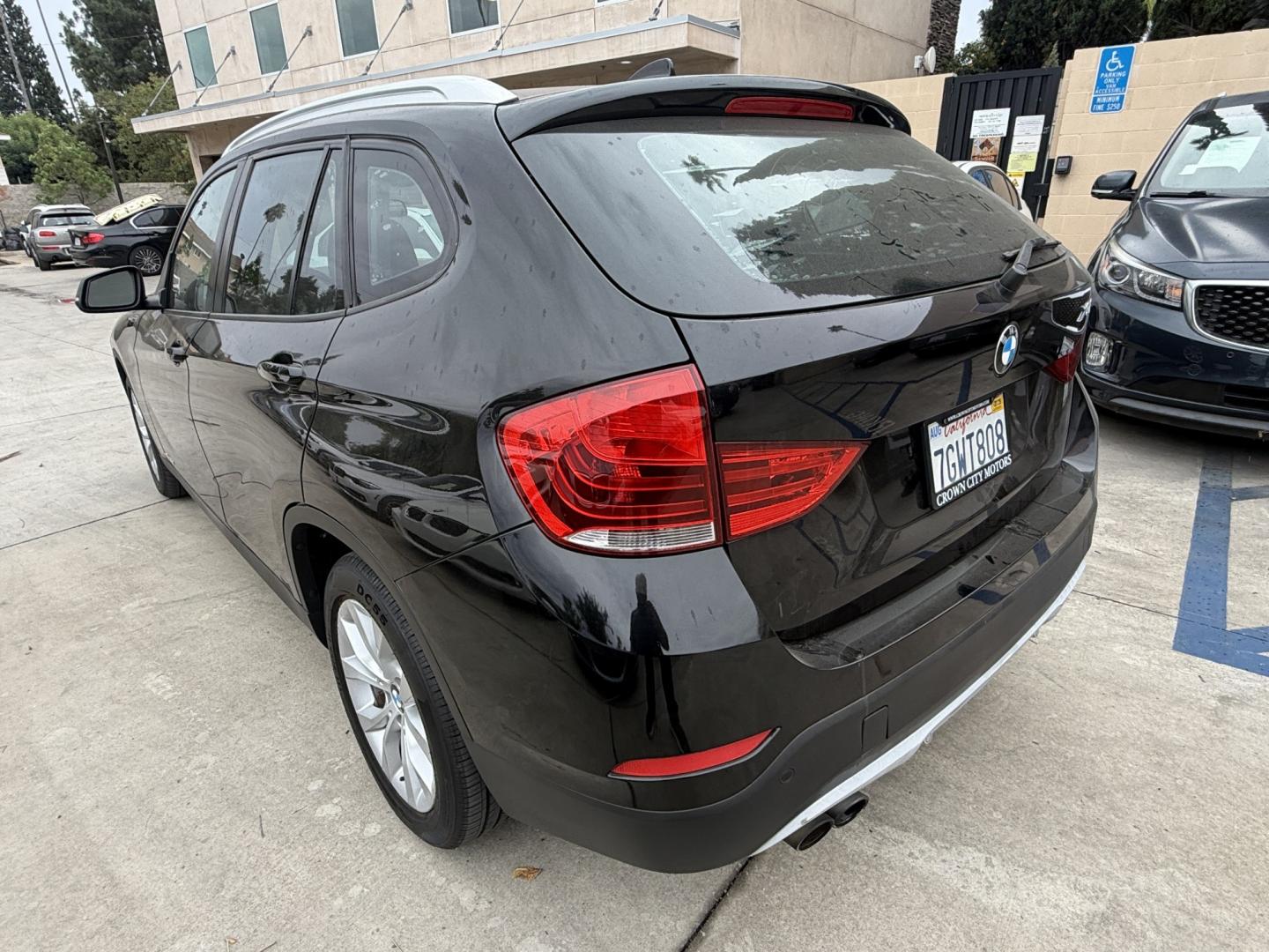 2014 Black /Black BMW X1 xDrive28i (WBAVL1C51EV) with an 2.0L L4 DOHC 16V engine, 8-Speed Automatic transmission, located at 30 S. Berkeley Avenue, Pasadena, CA, 91107, (626) 248-7567, 34.145447, -118.109398 - 2014 BMW X1 sDrive28i (Black on Black) – Pasadena Buy Here Pay Here | In-House Financing and Guaranteed Approval List Price: $7,795 | Dealer Document Fee: +$85.00 | Electronic Filing Fee: +$37.00 | Crown City Motors Price: $7,917 Drive today with bad credit, no credit, repossession, or bankr- Photo#2