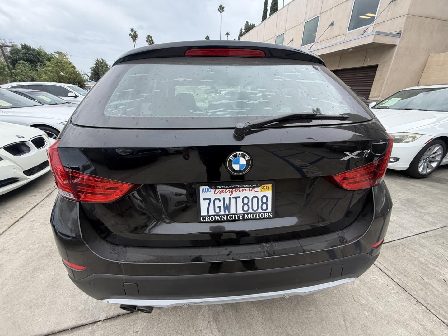 2014 Black /Black BMW X1 xDrive28i (WBAVL1C51EV) with an 2.0L L4 DOHC 16V engine, 8-Speed Automatic transmission, located at 30 S. Berkeley Avenue, Pasadena, CA, 91107, (626) 248-7567, 34.145447, -118.109398 - 2014 BMW X1 sDrive28i (Black on Black) – Pasadena Buy Here Pay Here | In-House Financing and Guaranteed Approval List Price: $7,795 | Dealer Document Fee: +$85.00 | Electronic Filing Fee: +$37.00 | Crown City Motors Price: $7,917 Drive today with bad credit, no credit, repossession, or bankr- Photo#3