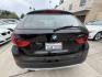 2014 Black /Black BMW X1 xDrive28i (WBAVL1C51EV) with an 2.0L L4 DOHC 16V engine, 8-Speed Automatic transmission, located at 30 S. Berkeley Avenue, Pasadena, CA, 91107, (626) 248-7567, 34.145447, -118.109398 - 2014 BMW X1 sDrive28i (Black on Black) – Pasadena Buy Here Pay Here | In-House Financing and Guaranteed Approval List Price: $7,795 | Dealer Document Fee: +$85.00 | Electronic Filing Fee: +$37.00 | Crown City Motors Price: $7,917 Drive today with bad credit, no credit, repossession, or bankr- Photo#3