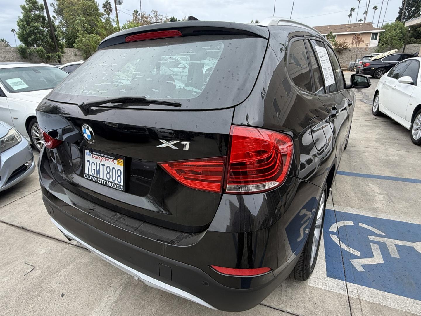 2014 Black /Black BMW X1 xDrive28i (WBAVL1C51EV) with an 2.0L L4 DOHC 16V engine, 8-Speed Automatic transmission, located at 30 S. Berkeley Avenue, Pasadena, CA, 91107, (626) 248-7567, 34.145447, -118.109398 - 2014 BMW X1 sDrive28i (Black on Black) – Pasadena Buy Here Pay Here | In-House Financing and Guaranteed Approval List Price: $7,795 | Dealer Document Fee: +$85.00 | Electronic Filing Fee: +$37.00 | Crown City Motors Price: $7,917 Drive today with bad credit, no credit, repossession, or bankr- Photo#4