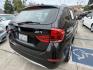 2014 Black /Black BMW X1 xDrive28i (WBAVL1C51EV) with an 2.0L L4 DOHC 16V engine, 8-Speed Automatic transmission, located at 30 S. Berkeley Avenue, Pasadena, CA, 91107, (626) 248-7567, 34.145447, -118.109398 - 2014 BMW X1 sDrive28i (Black on Black) – Pasadena Buy Here Pay Here | In-House Financing and Guaranteed Approval List Price: $7,795 | Dealer Document Fee: +$85.00 | Electronic Filing Fee: +$37.00 | Crown City Motors Price: $7,917 Drive today with bad credit, no credit, repossession, or bankr- Photo#4